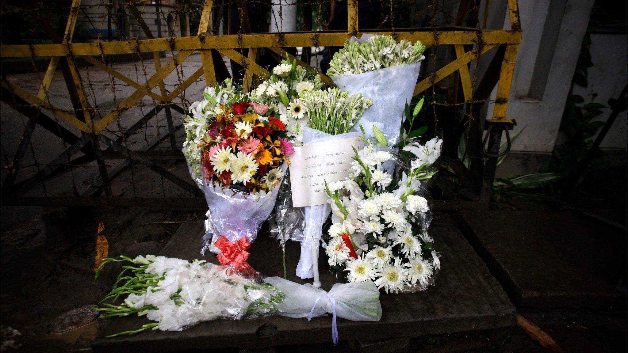 Floral tributes are placed near the site of an terrorist attack, to pay homage to the victims of the 01 July hostage taking at the Holey Artisan Bakery, in Dhaka, Bangladesh, 03 July 2016