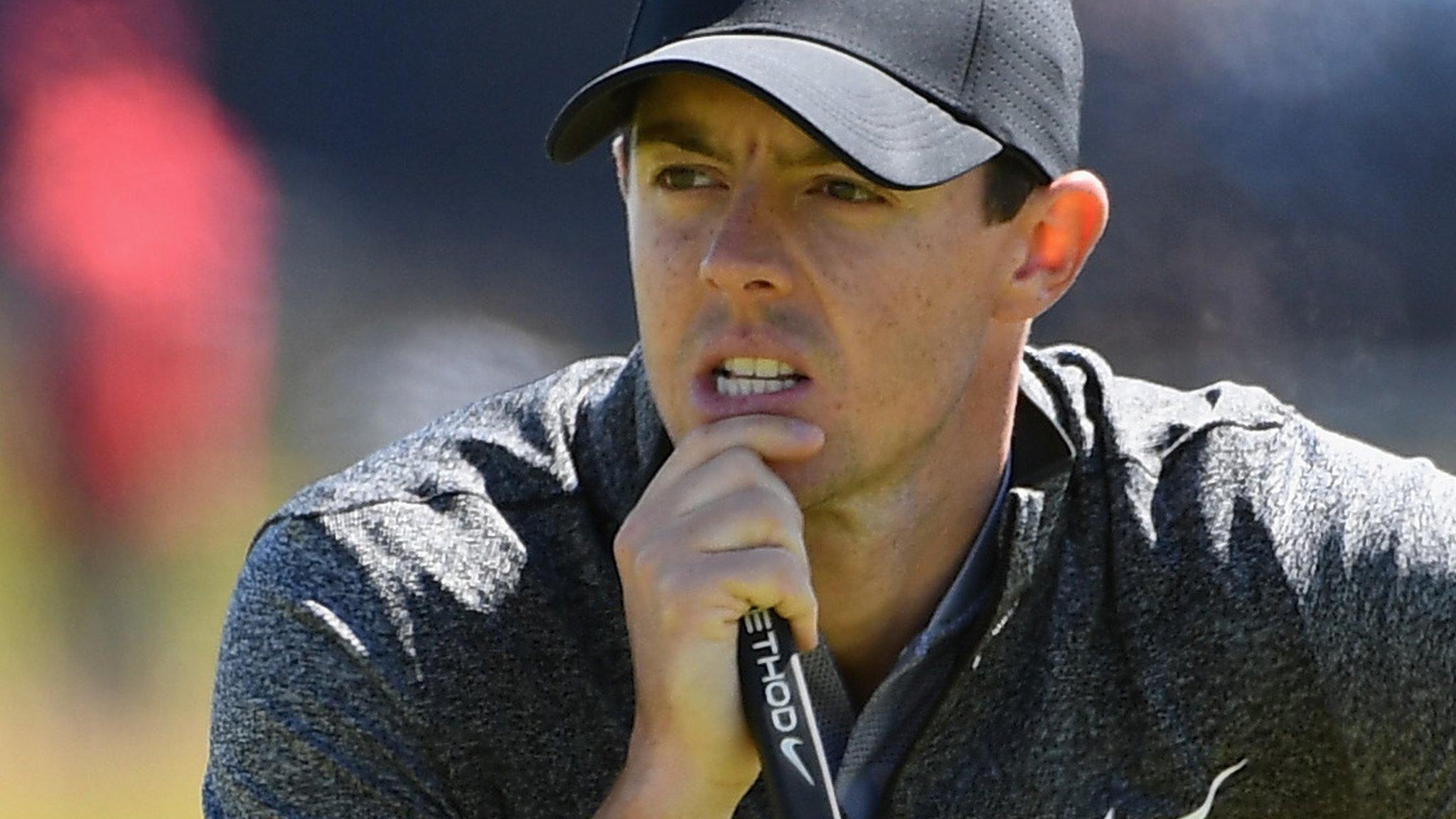 Rory McIlroy lines up a putt on the 16th at Troon on Thursday