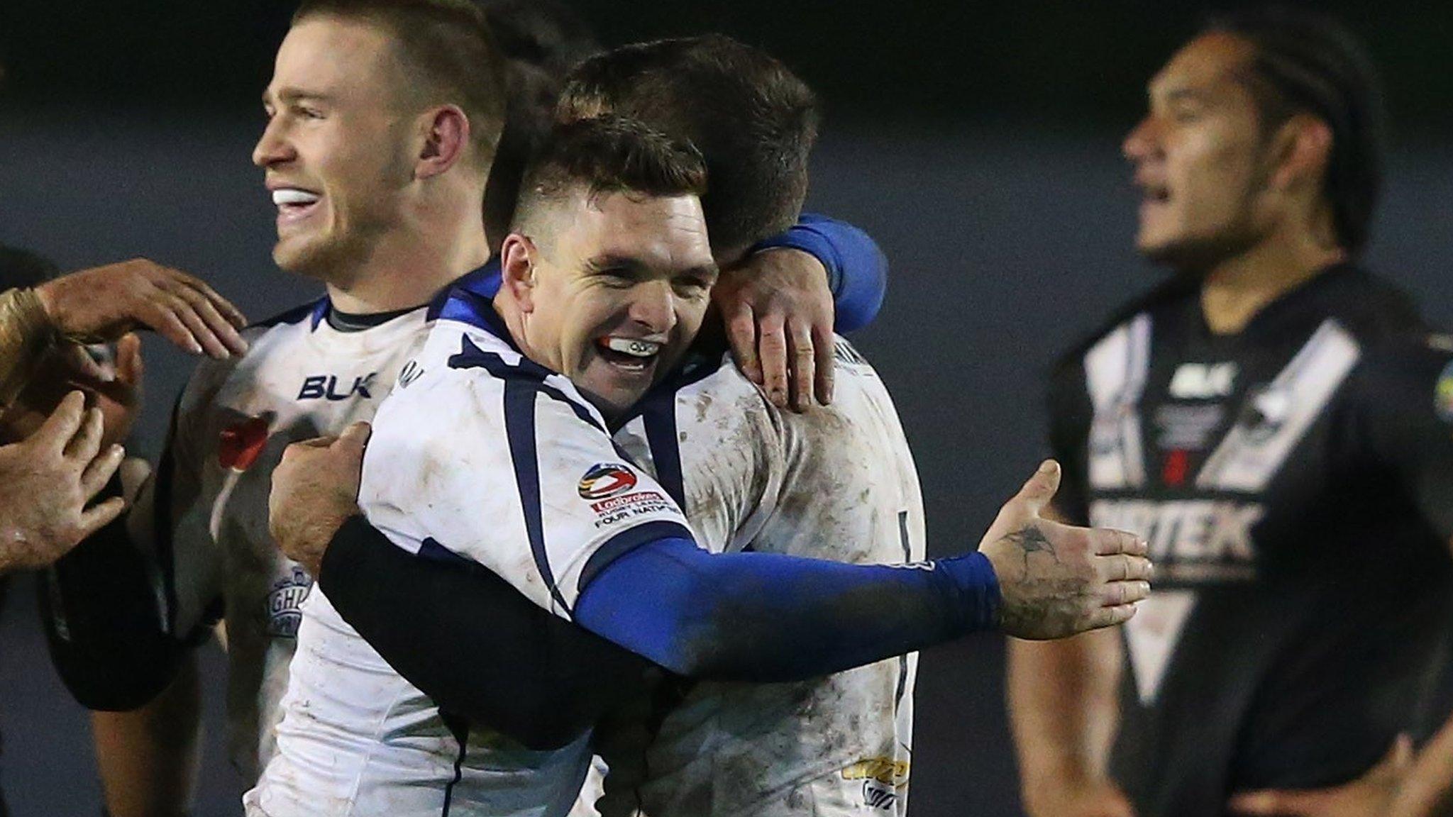 Danny Brough celebrates with Scotland team-mates after draw with New Zealand