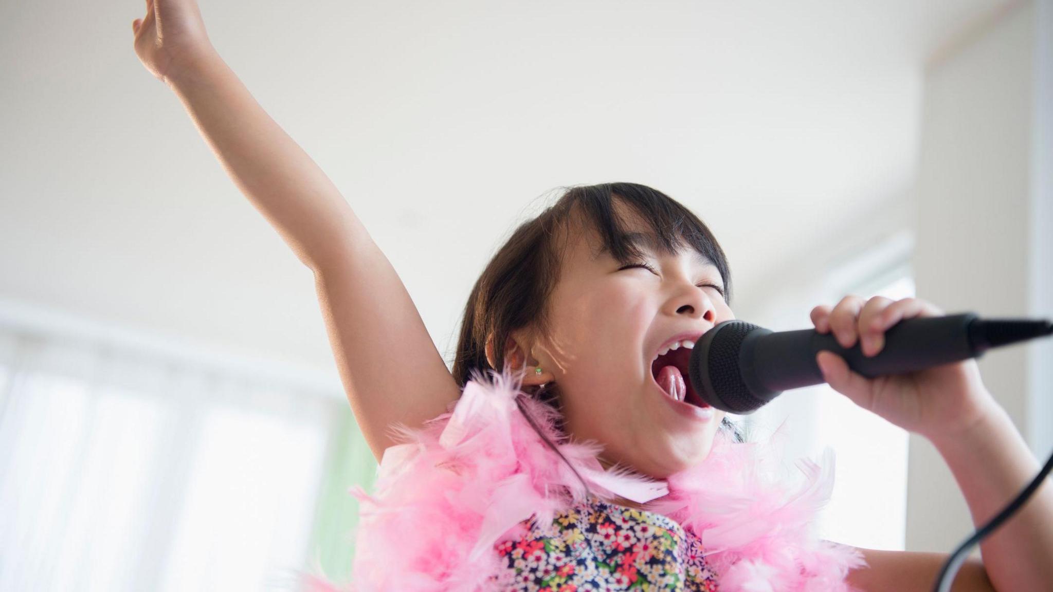 girl singing karaoke