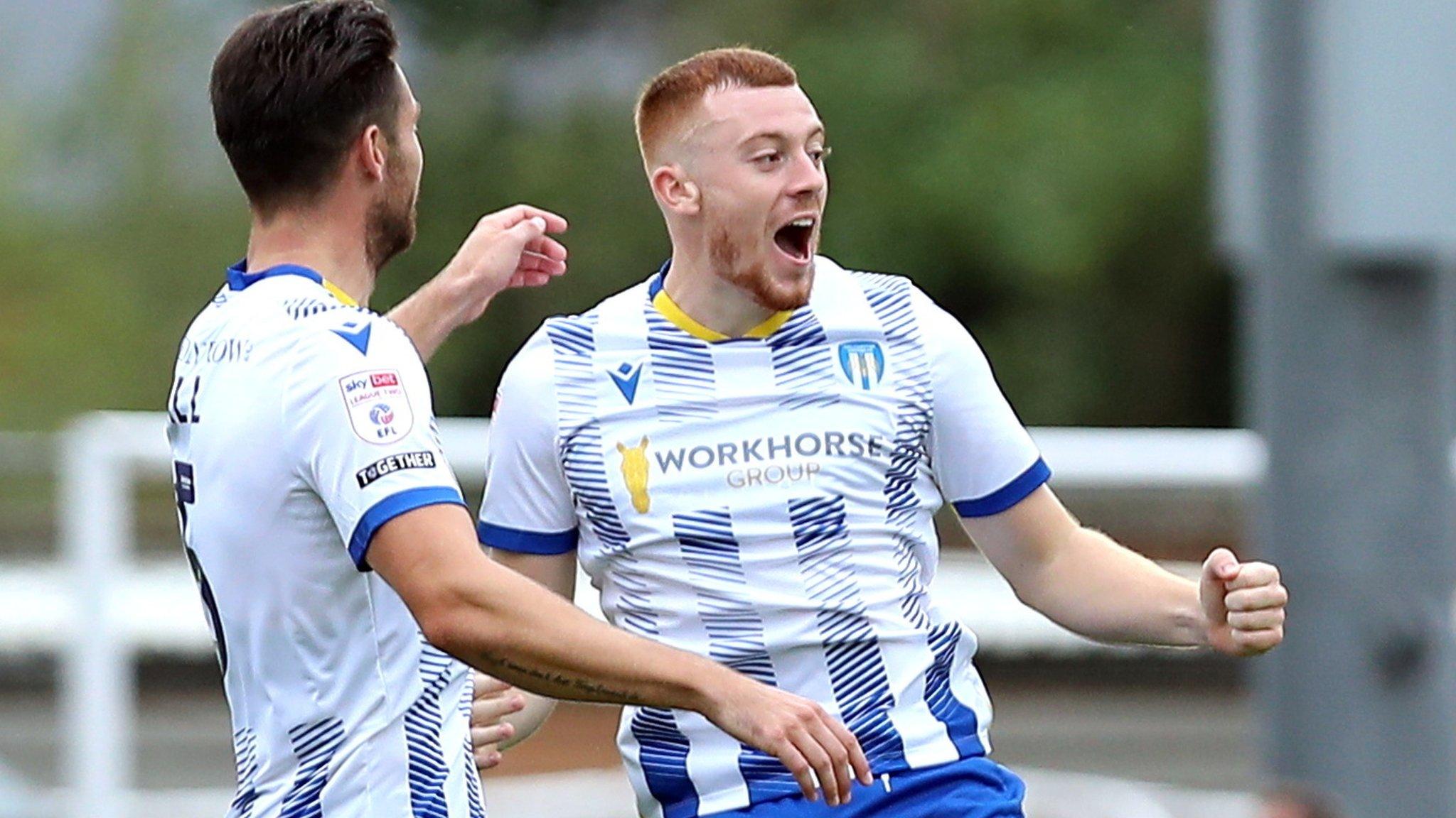 Colchester celebrate their fifth goal