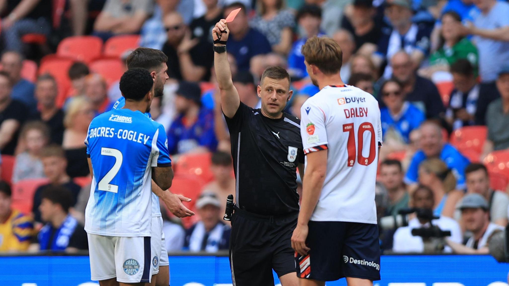 Josh Dacres-Cogley shown a red card