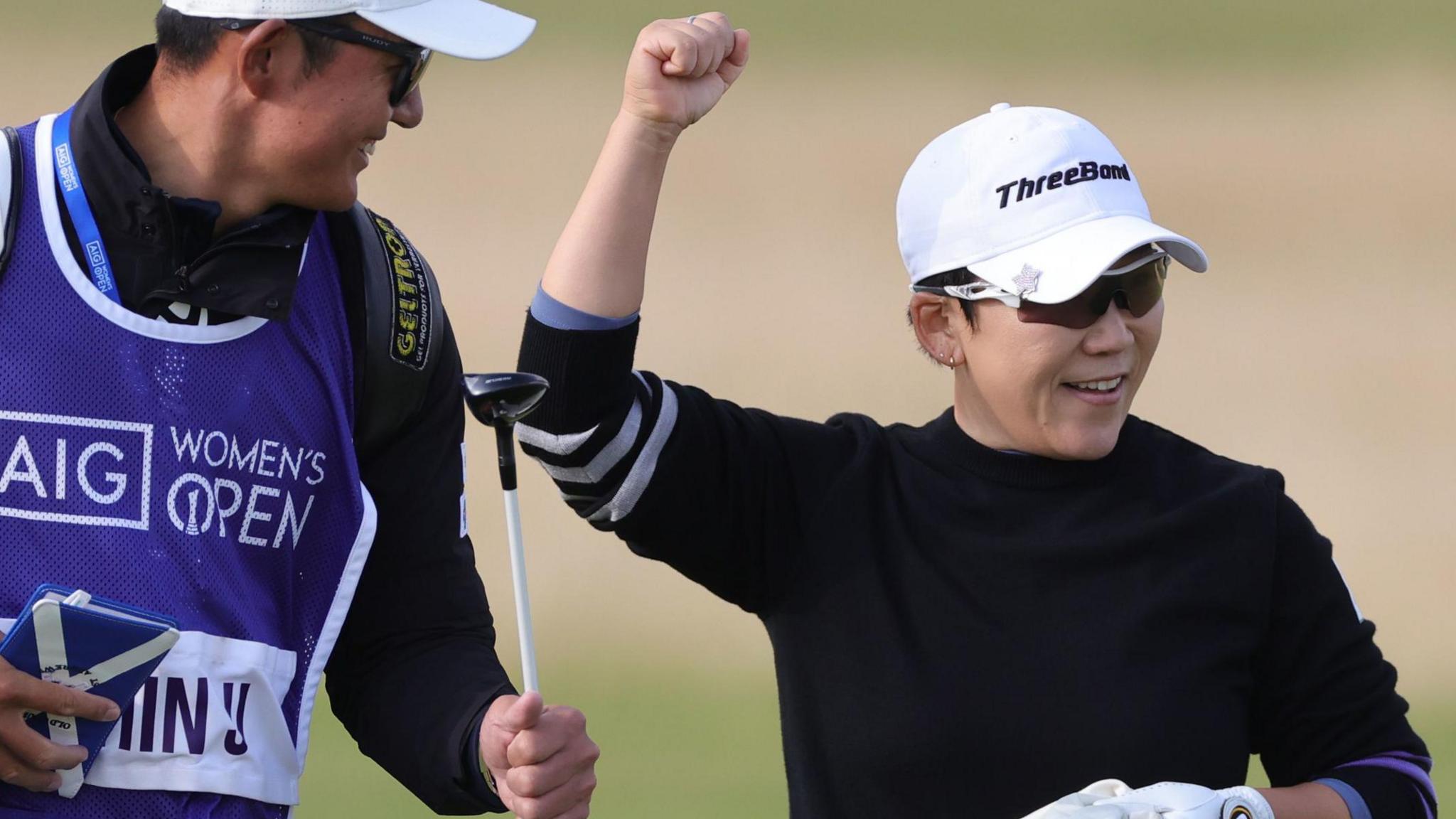 Jiyai Shin celebrates with her caddie during the third round of the 2024 Women's Open