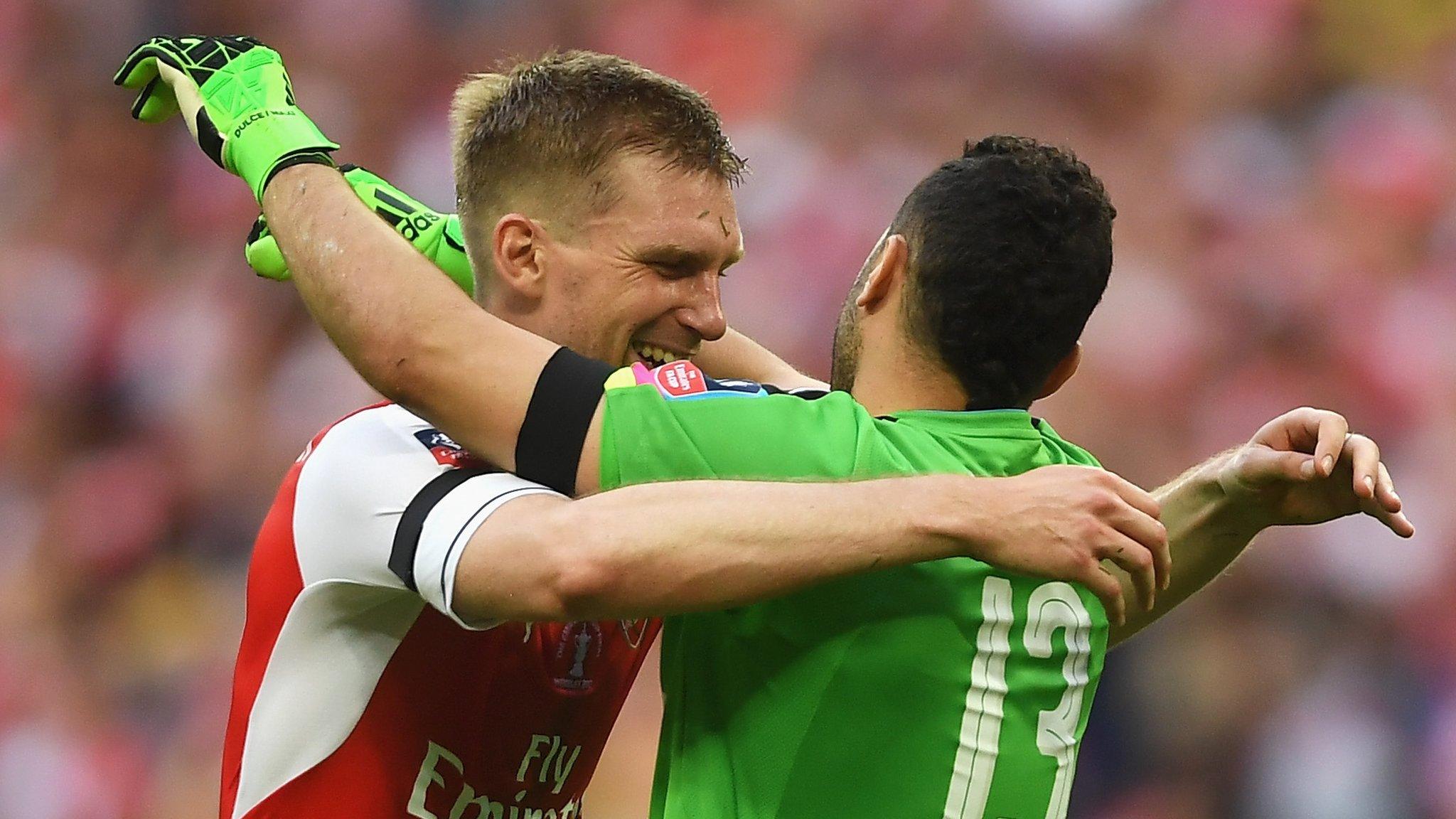 Per Mertesacker and David Ospina