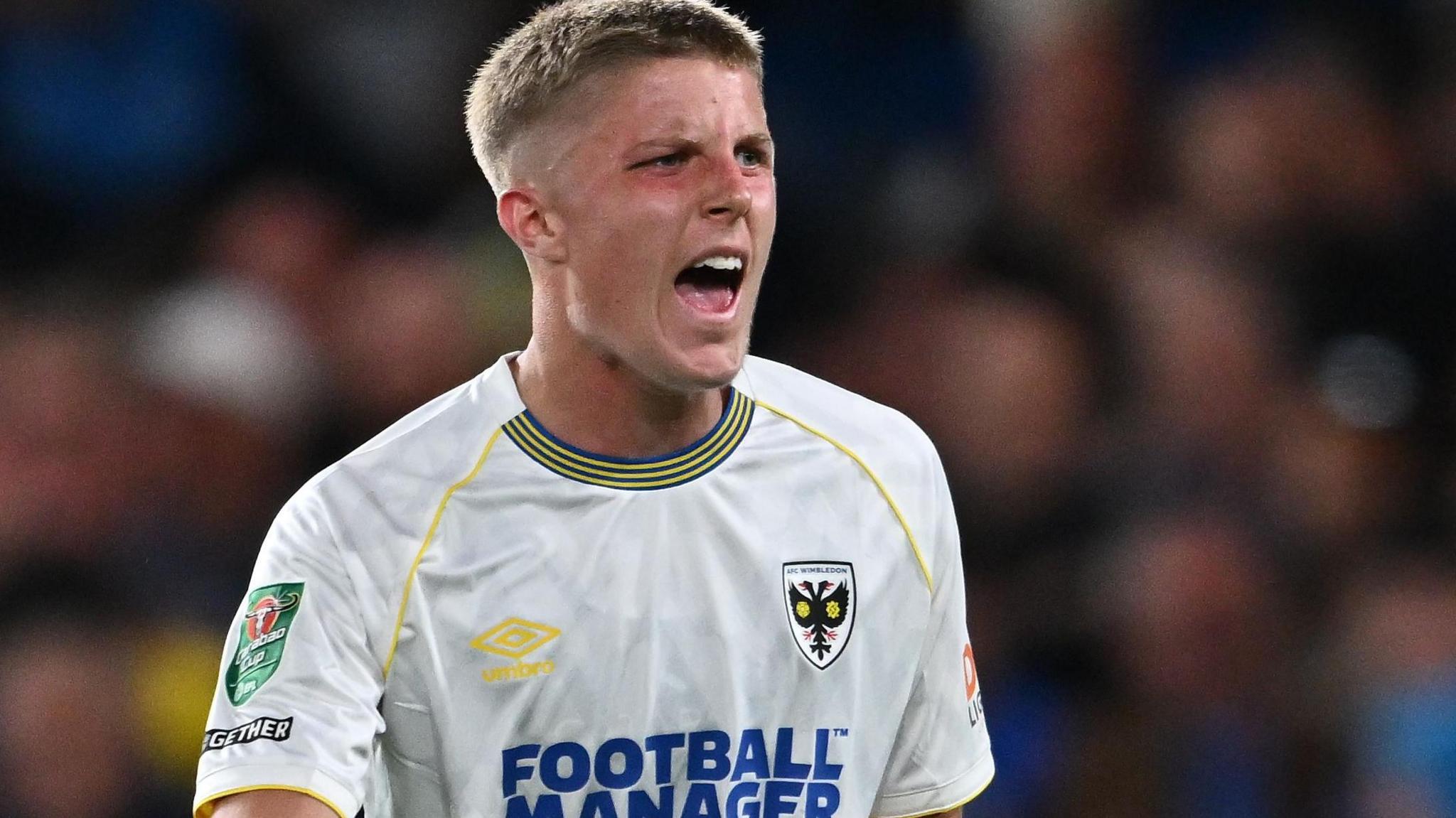 Morgan Williams in action for AFC Wimbledon against Chelsea in August 2023