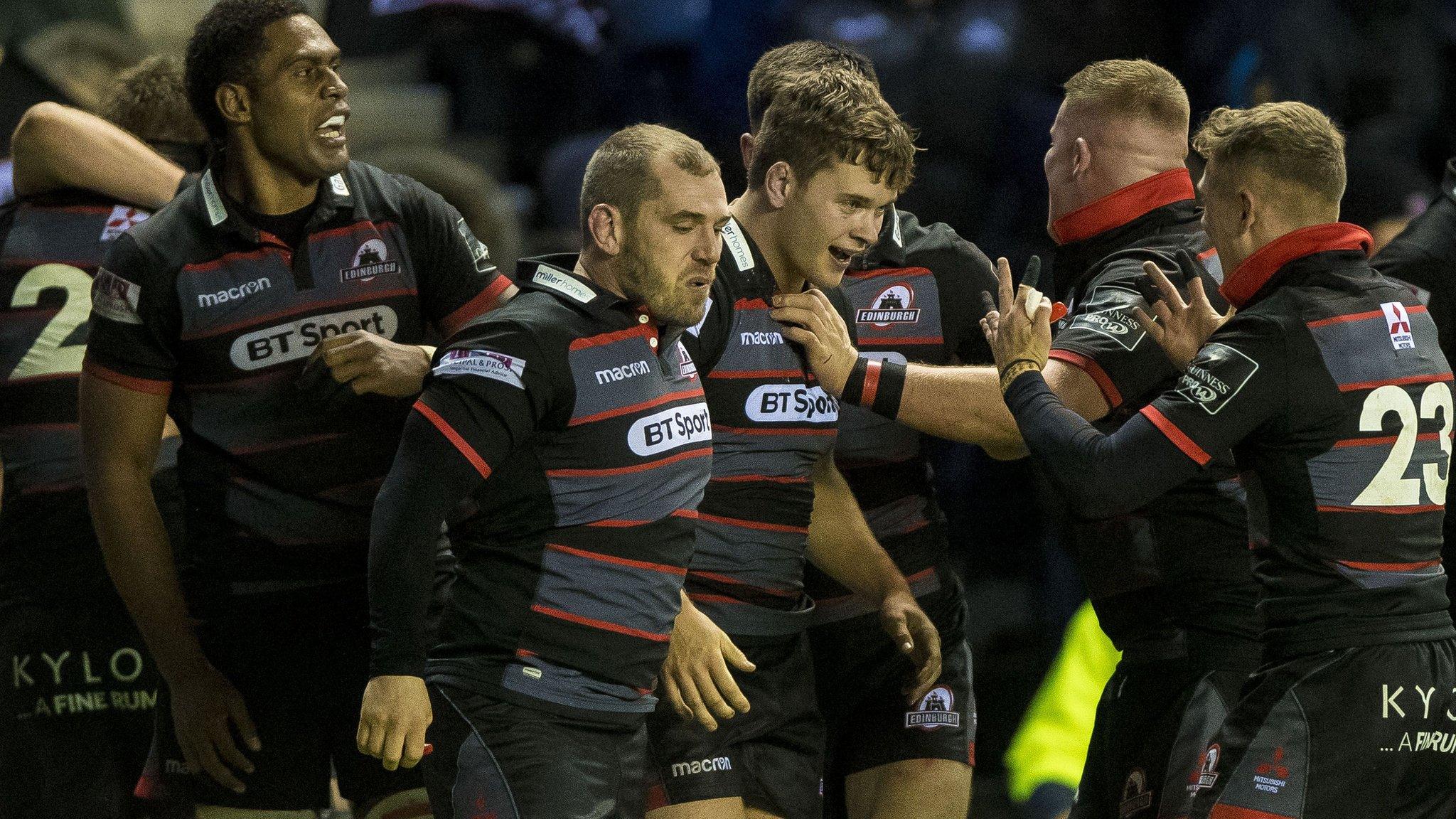 Edinburgh players celebrate beating Glasgow