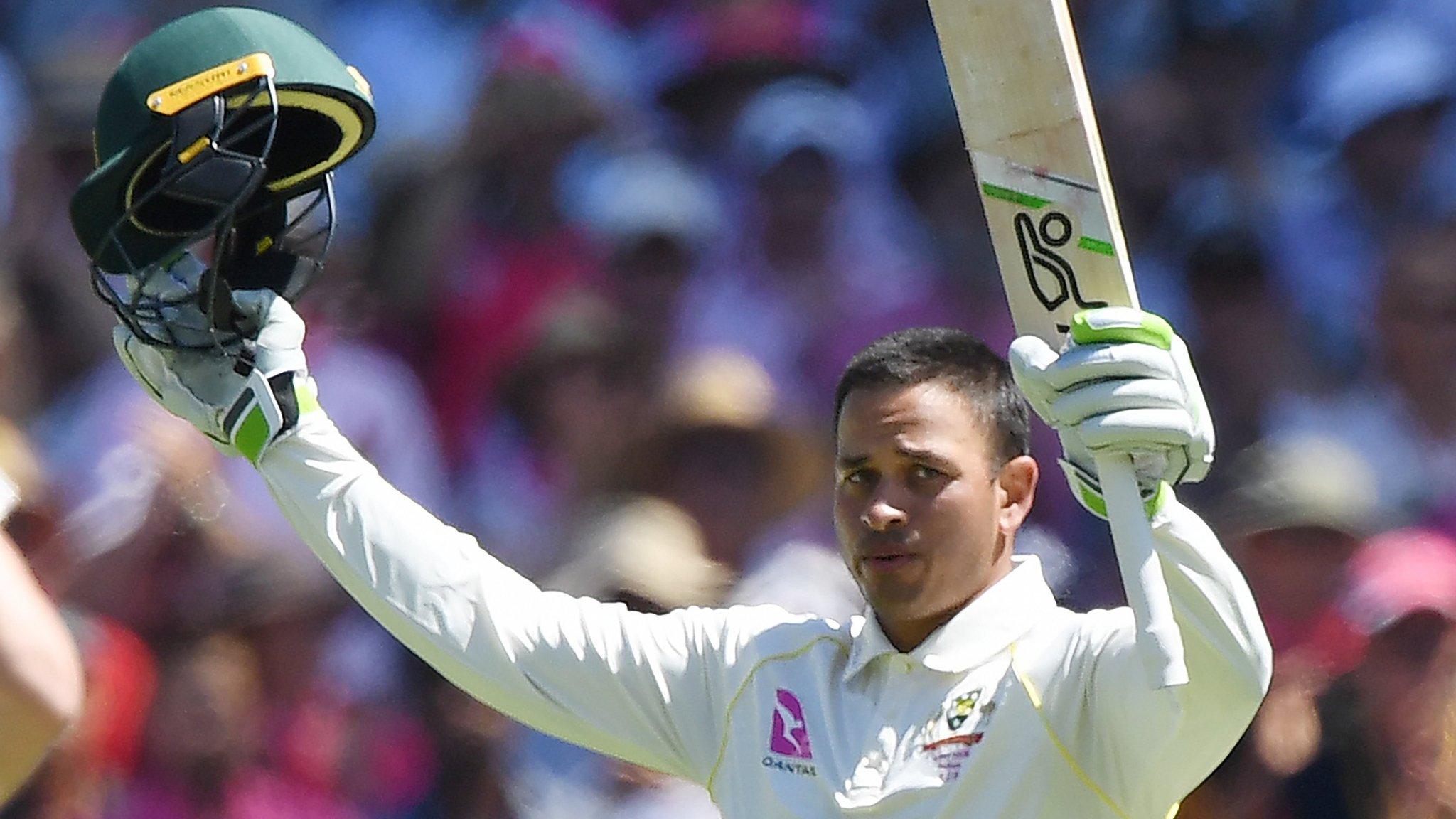 Usman Khawaja celebrates his 100