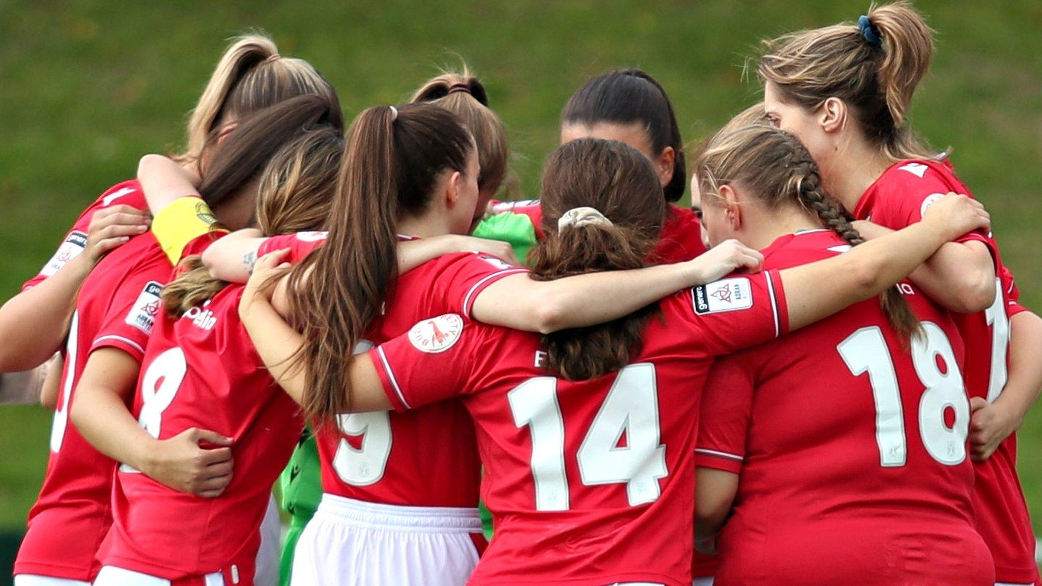 Wrexham players in a huddle