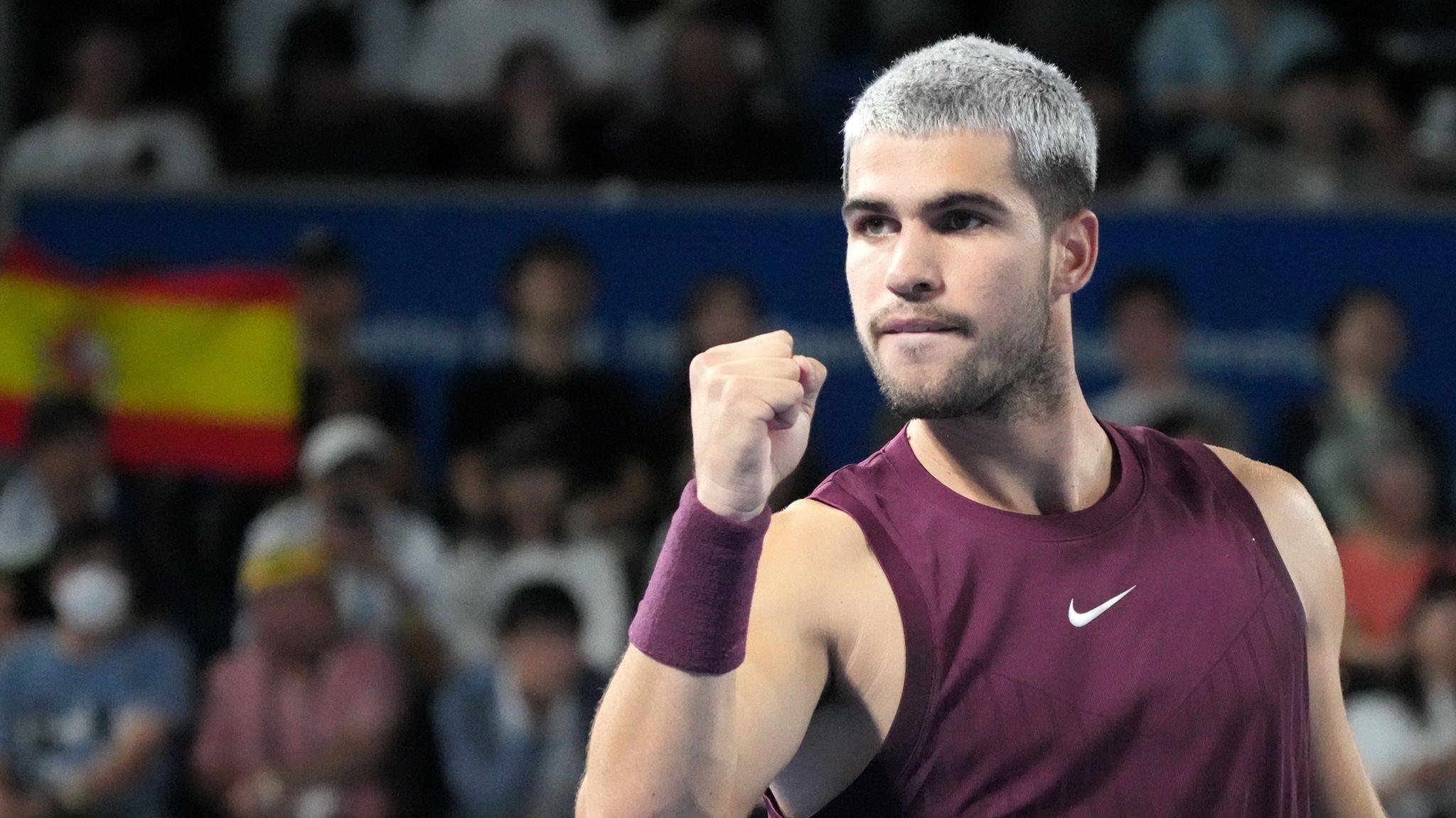 Carlos Alcaraz celebrates a point at the Japan Open