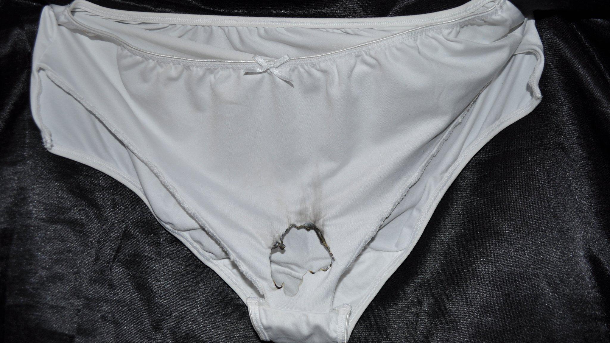 Knickers with a burnt hole in the bottom