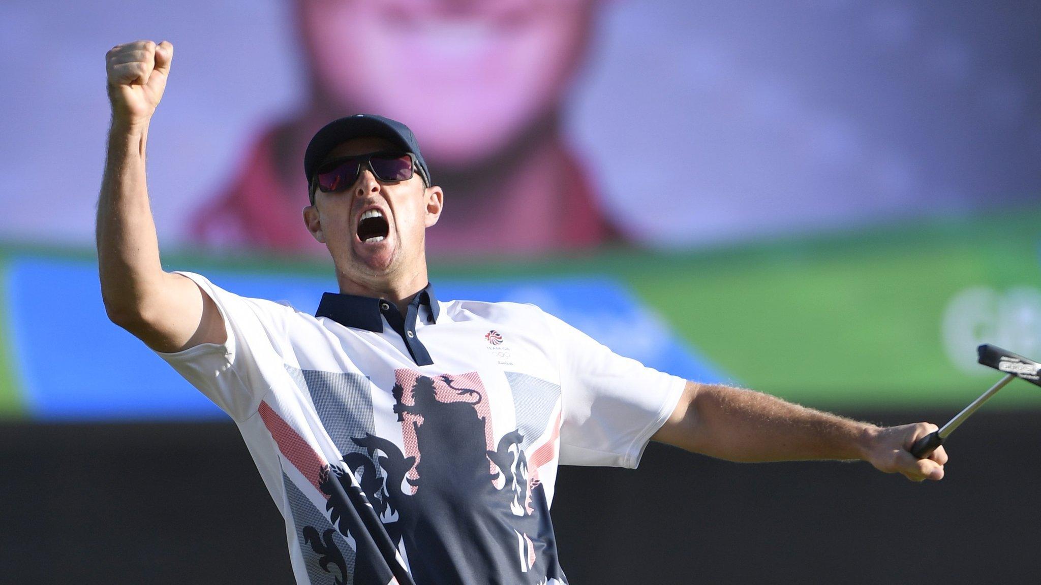 Justin Rose celebrates