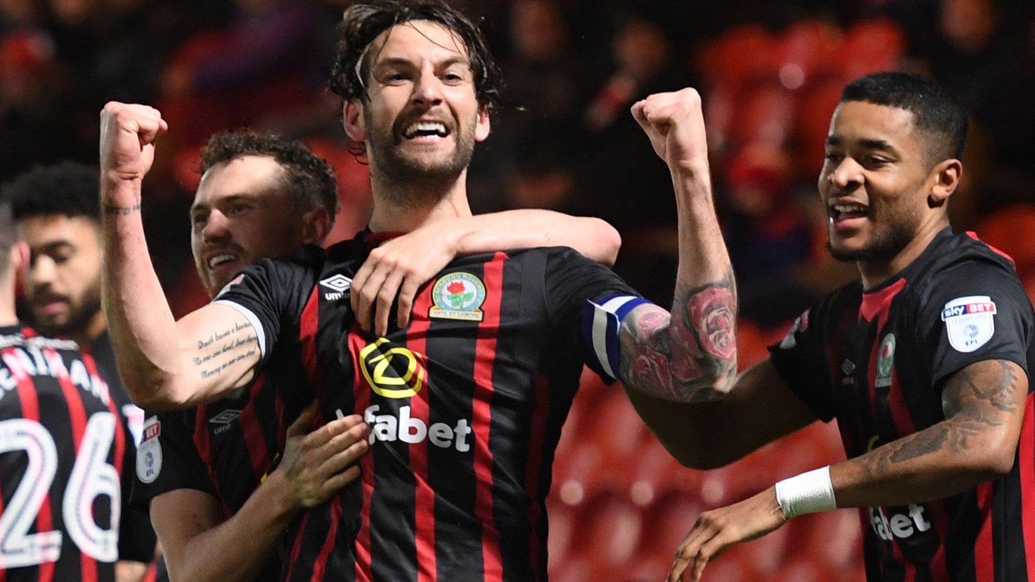 Blackburn defender Charlie Mulgrew celebrates his winning goal against Doncaster with his teammates