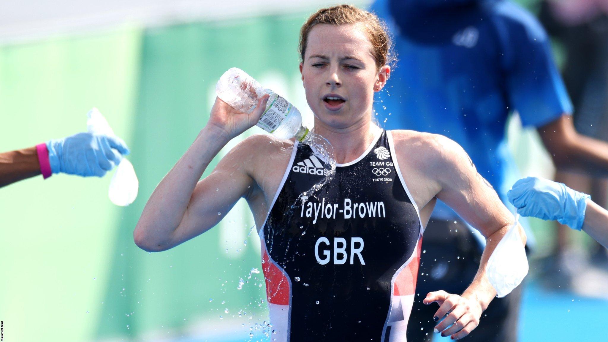 Georgia Taylor-Brown throwing water on herself