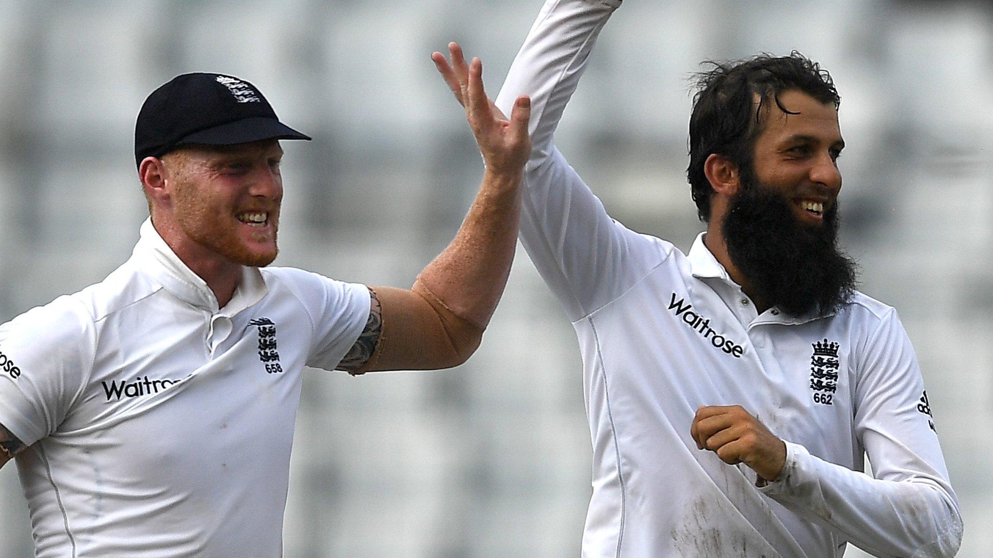 Ben Stokes and Moeen Ali celebrate for Eng;and