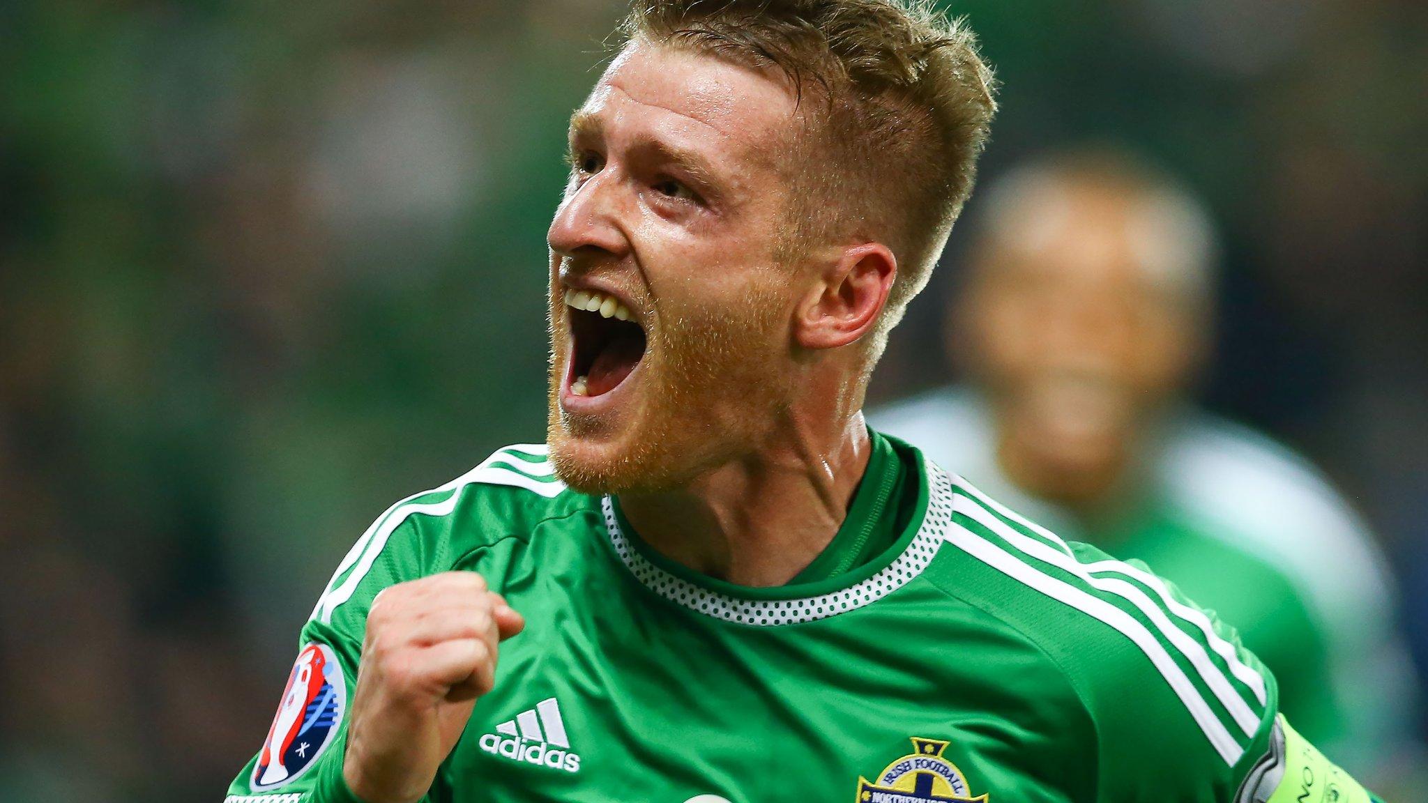 Steven Davis celebrates scoring for Northern Ireland