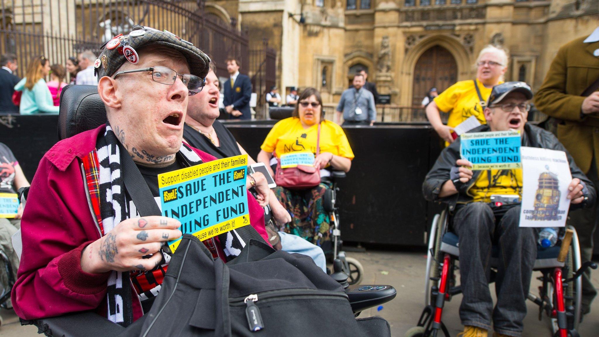 Disabled campaigners outside High Court