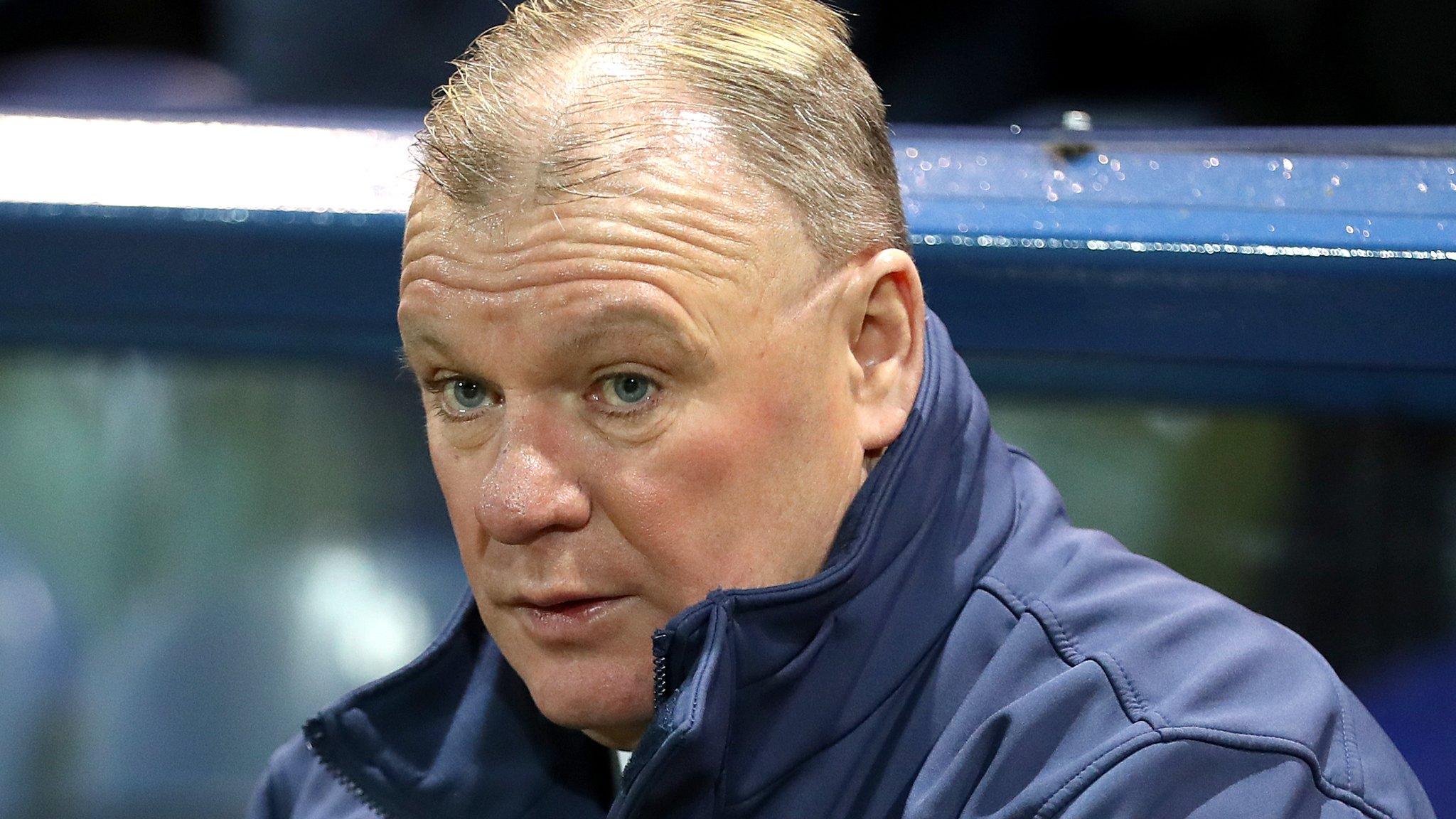 Steve Evans in the Mansfield dugout