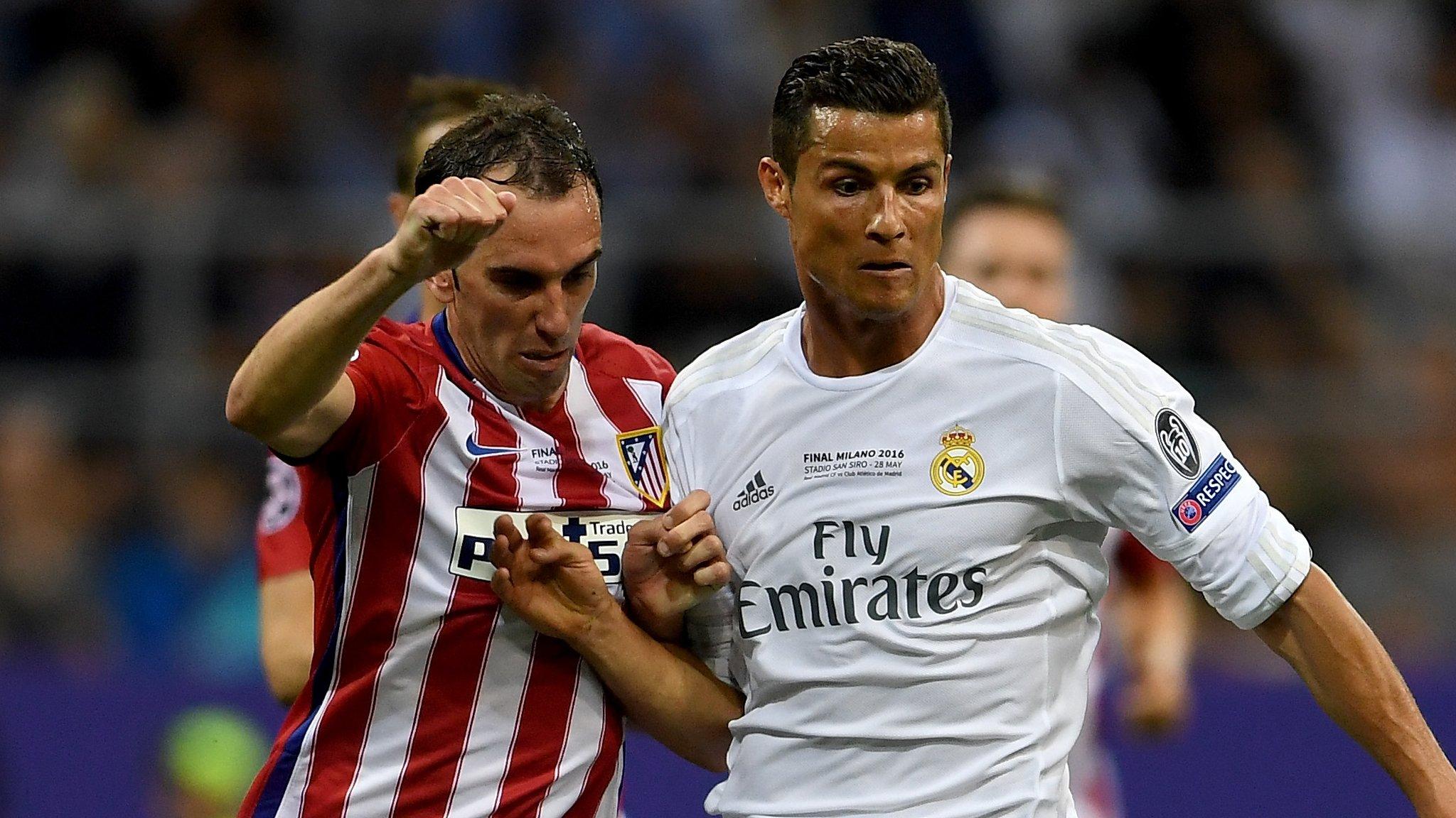 Diego Godin (left) and Cristiano Ronaldo