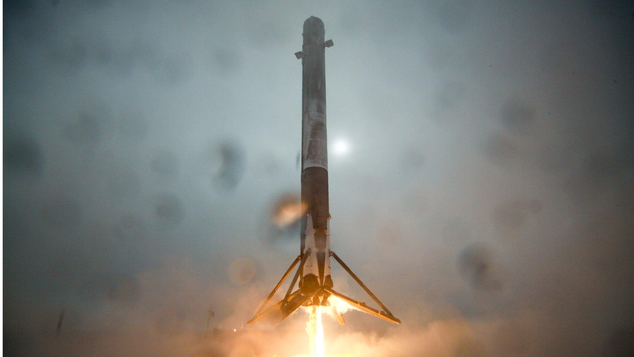 In this handout provided by the National Aeronautics and Space Administration (NASA), SpaceX's Falcon 9 rocket that successfully launched the Jason-3 spacecraft into orbit approaches centre of landing drone ship on 17 January 2016