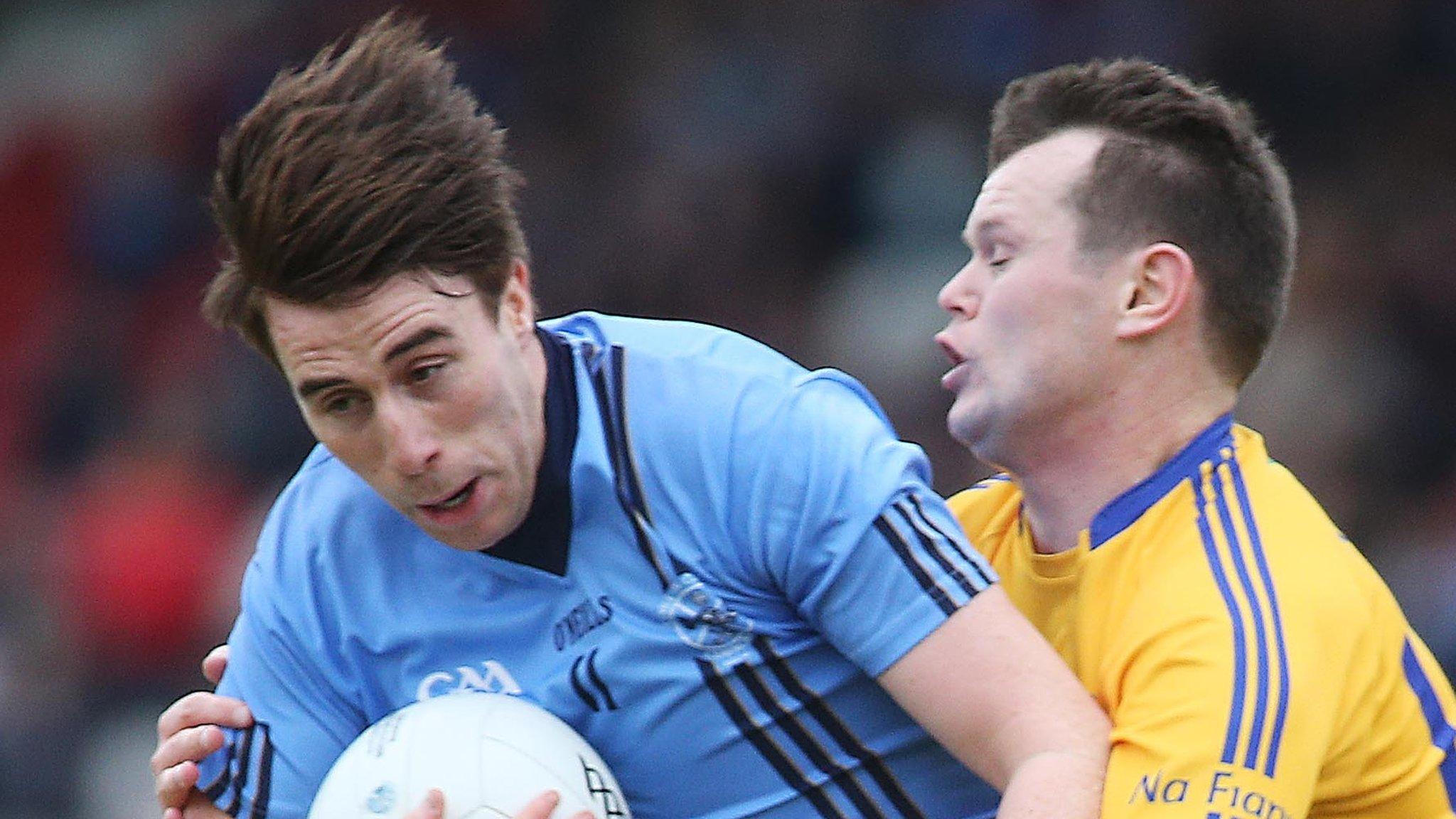 Coalisland's Peter Donnelly tackles Killyclogher's Conall McCann