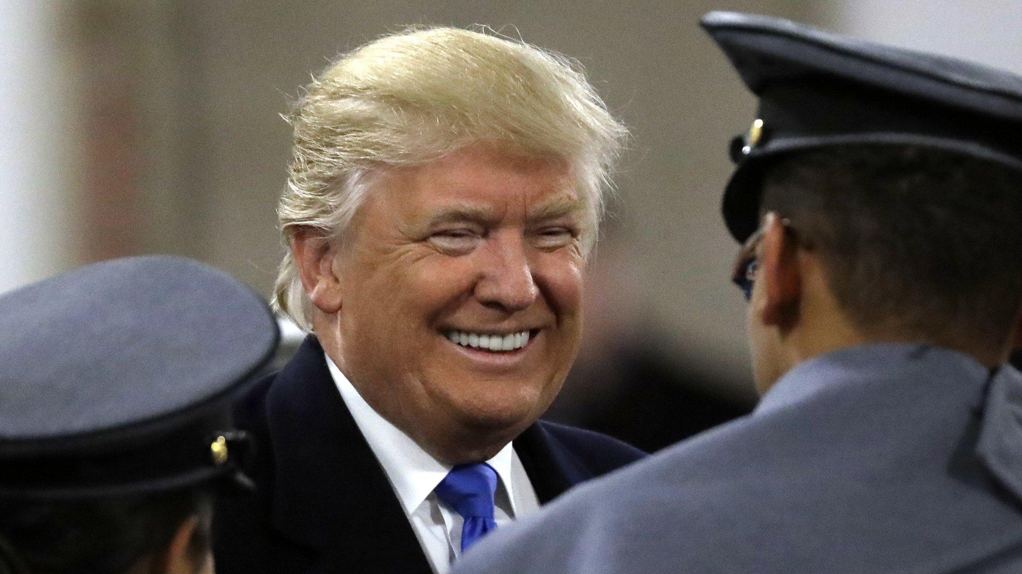 Donald Trump greets Army Cadets at a college football game in Baltimore on Saturday