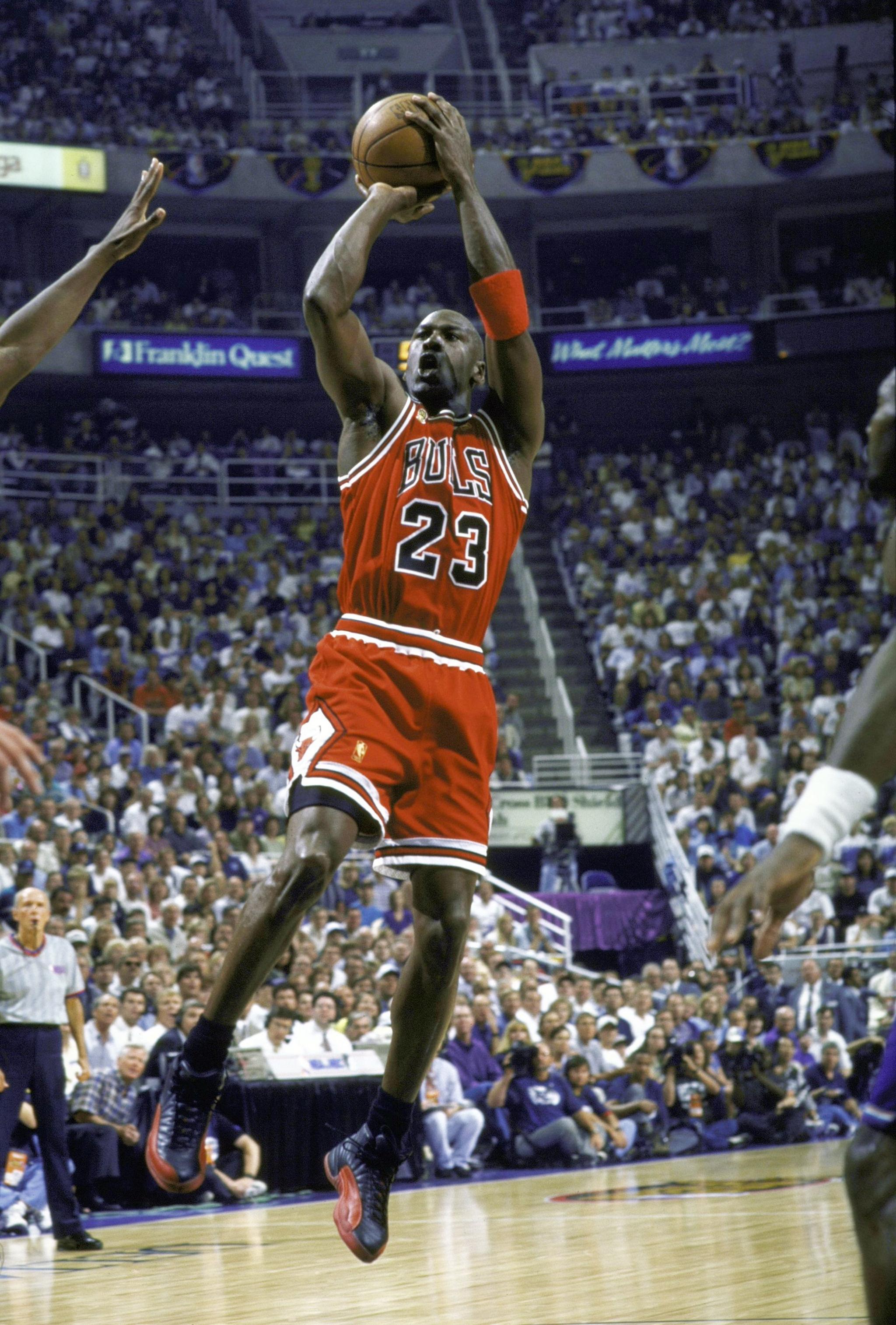 Michael Jordan shoots the basketball.