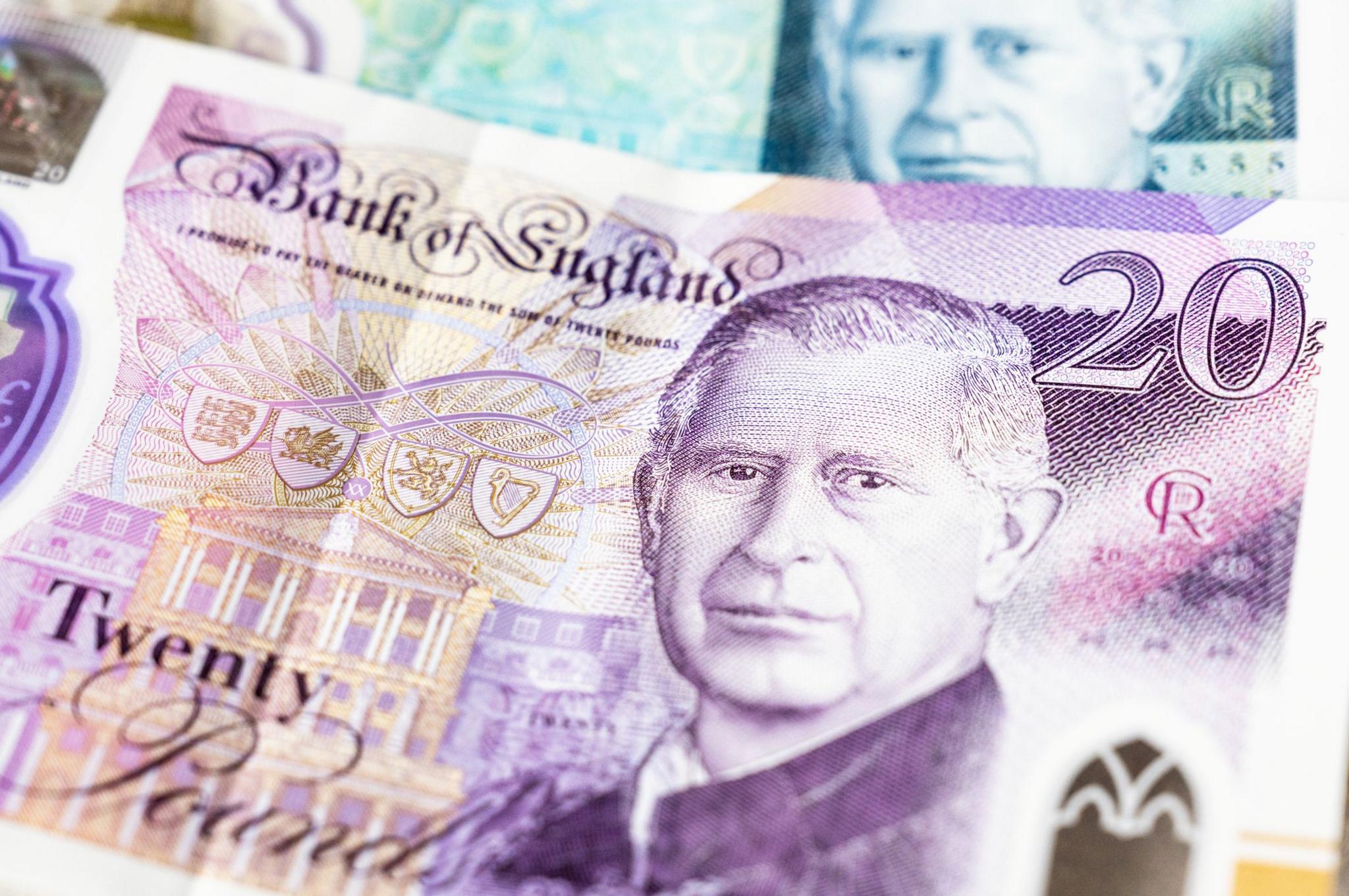 20 pound note with king charles printed on it.