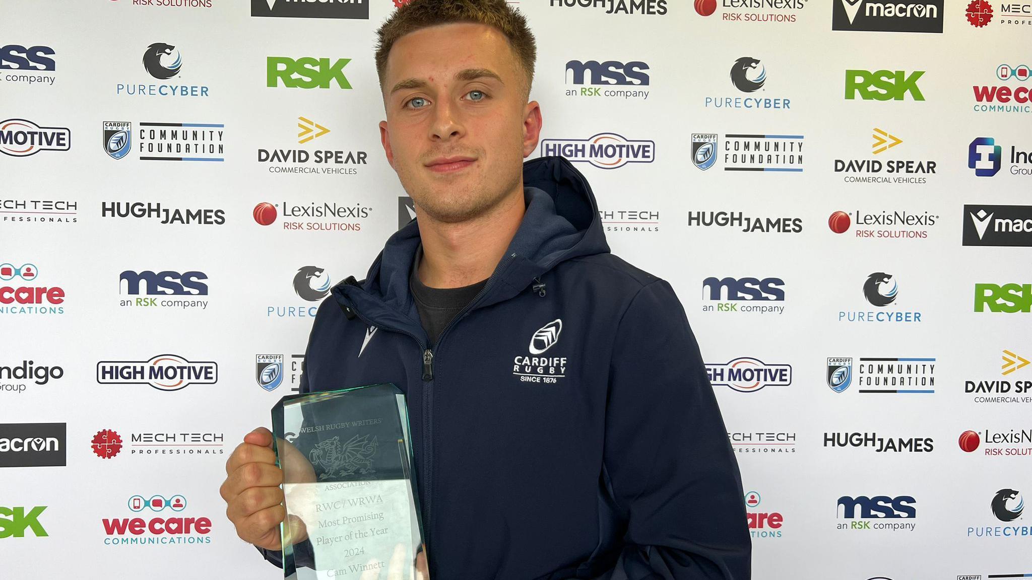 Cameron Winnett pictured with his trophy