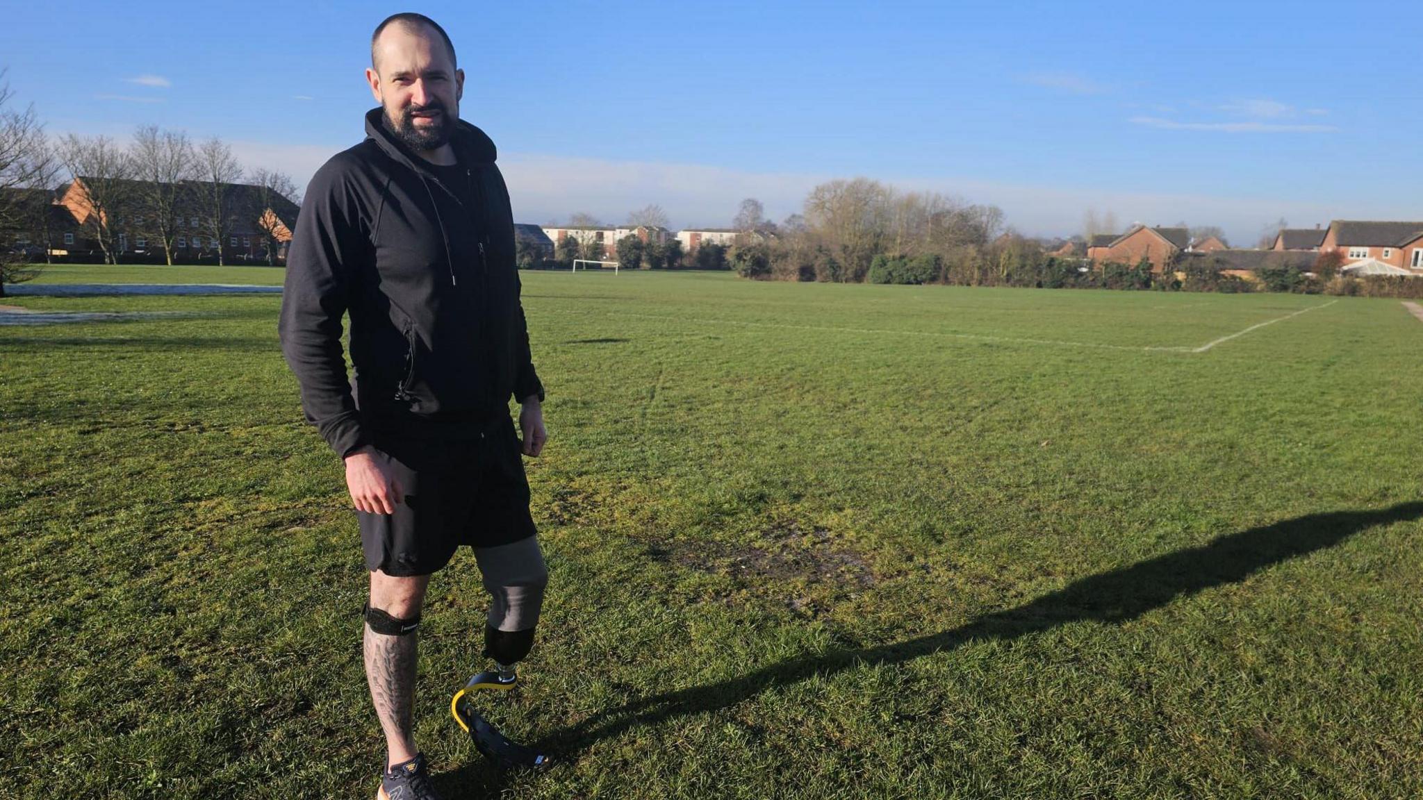 Greg Markowski wearing his blade prosthetic 