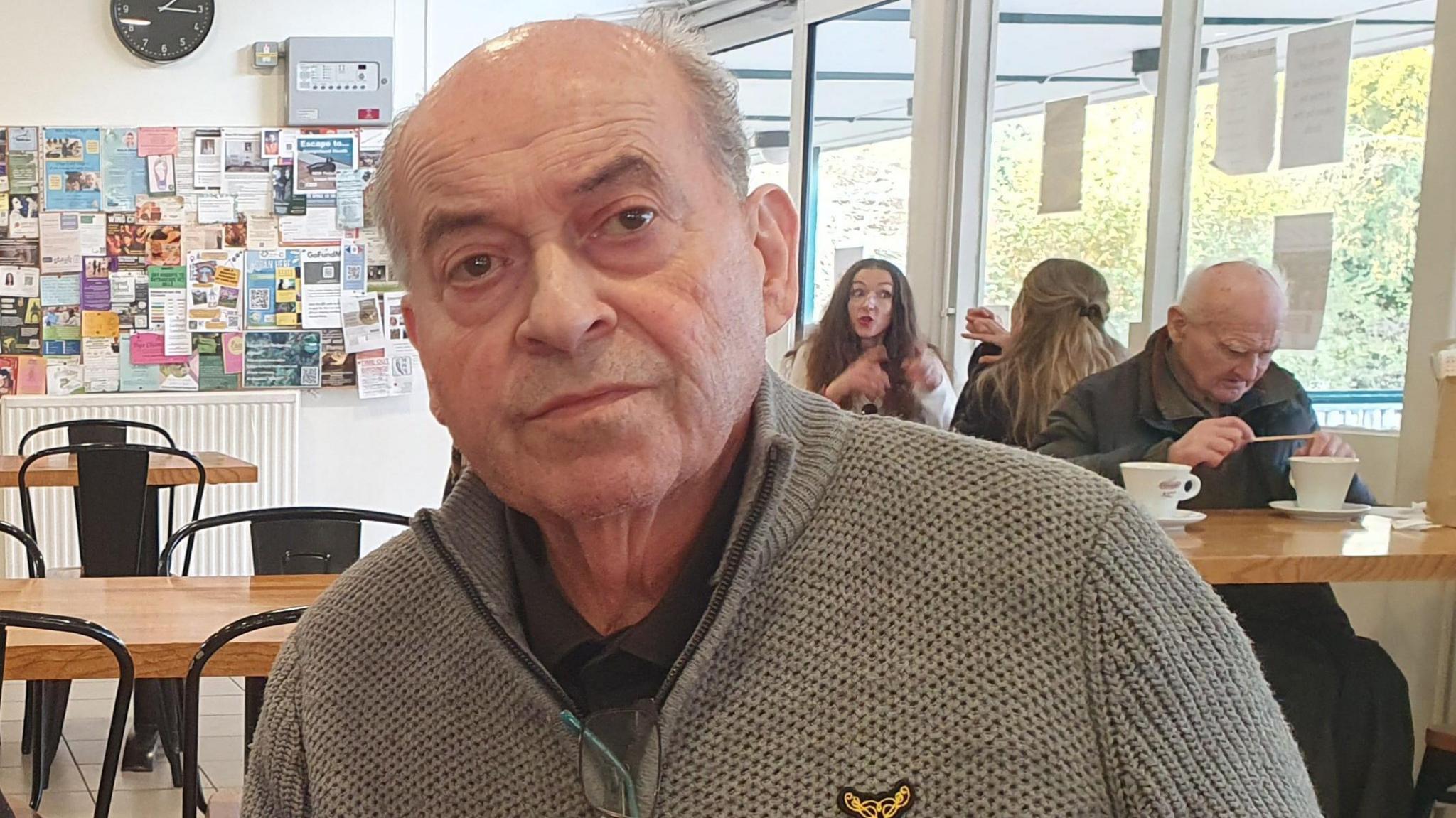 Alberto D'Auria in a jumper sat inside Parliament Hill Café.