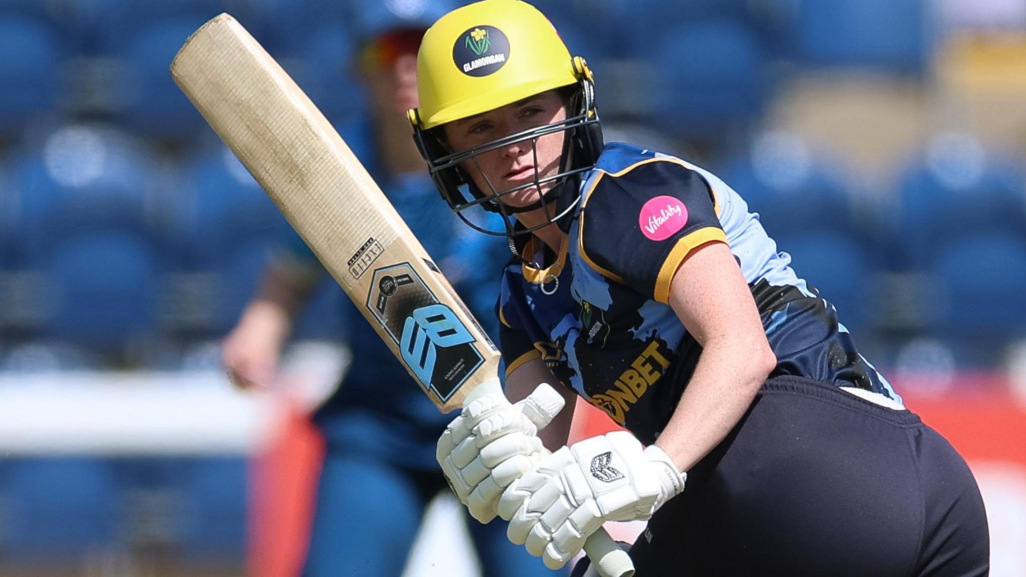 Batter Bethan Ellis plays a shot