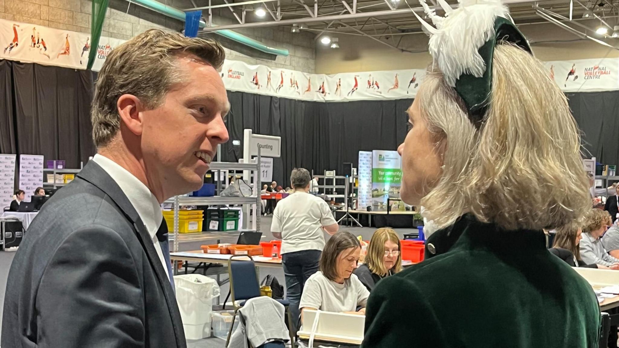 Tom Purglove at the 2024 election count with Northamptonshire High Sheriff Amy Crawfurd