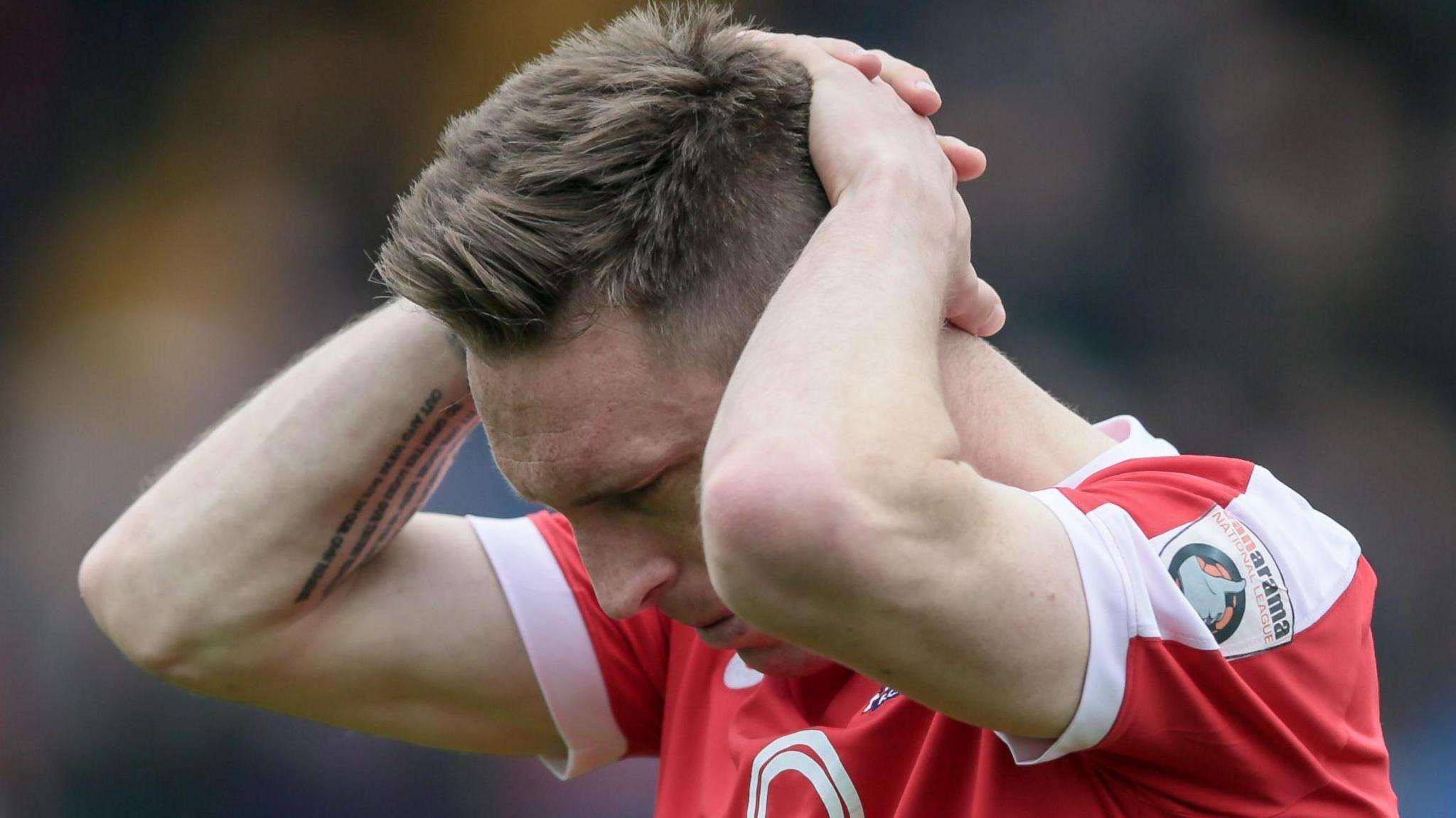 York City's Danny Parslow with his hands on top of his head after relegation to the National League North in 2017