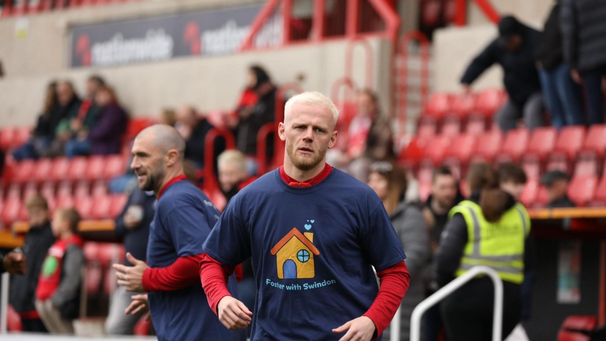 Swindon Town Striker Charlie Austin (Left) & defender Frazer Blake-Tracey (Right)