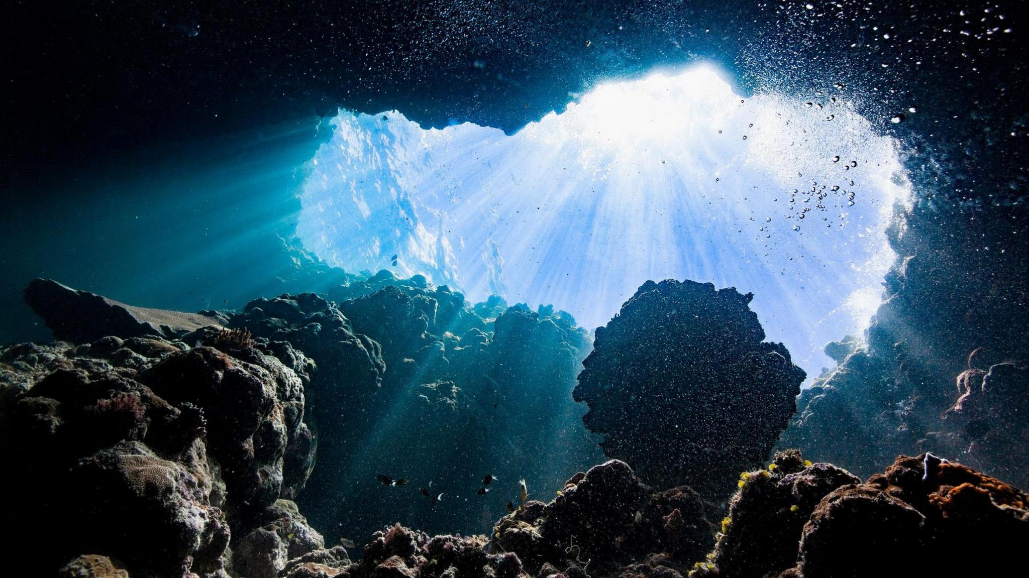 Sunlight shining into an ocean cave