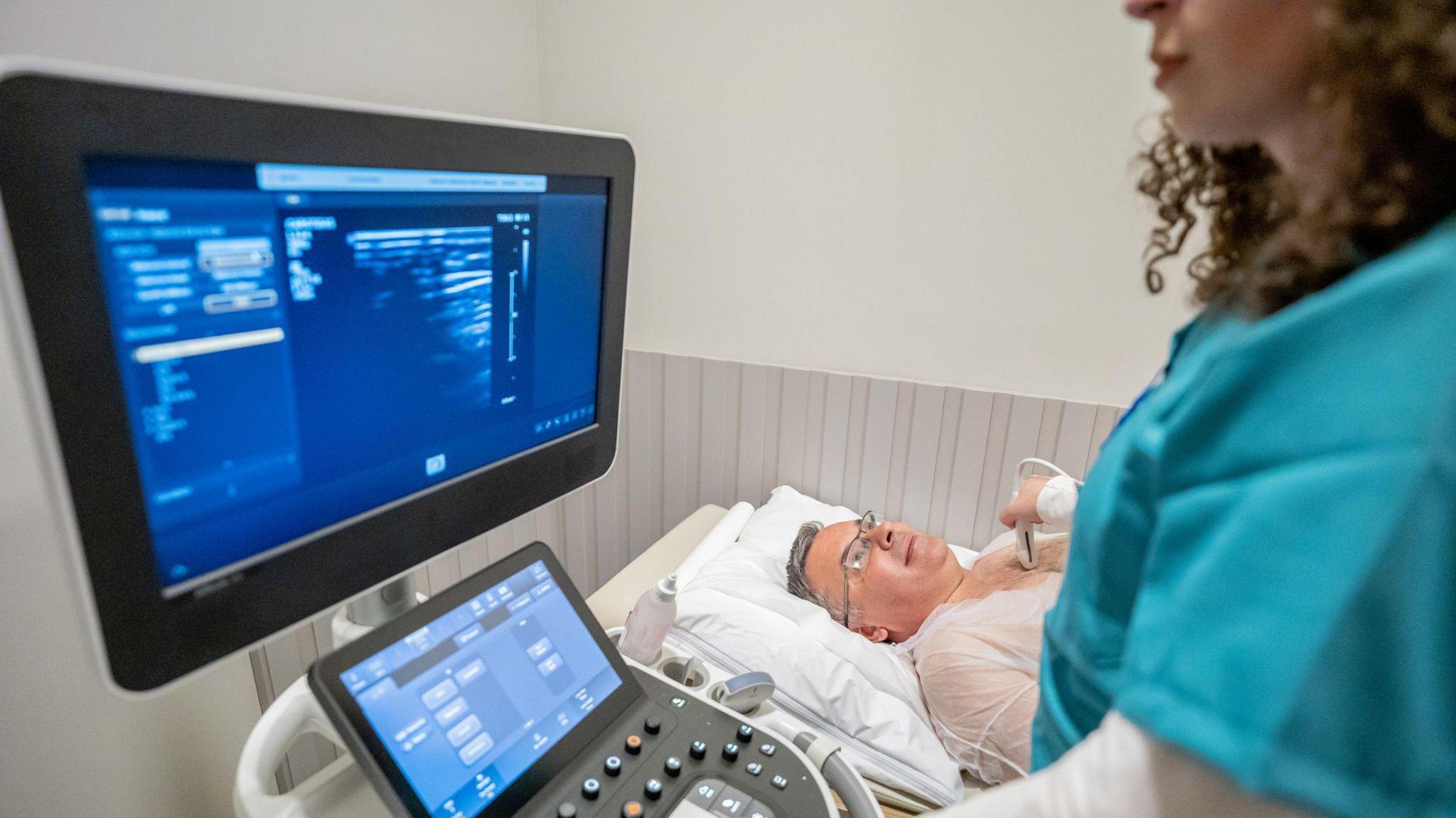 A man undergoing an echocardiogram