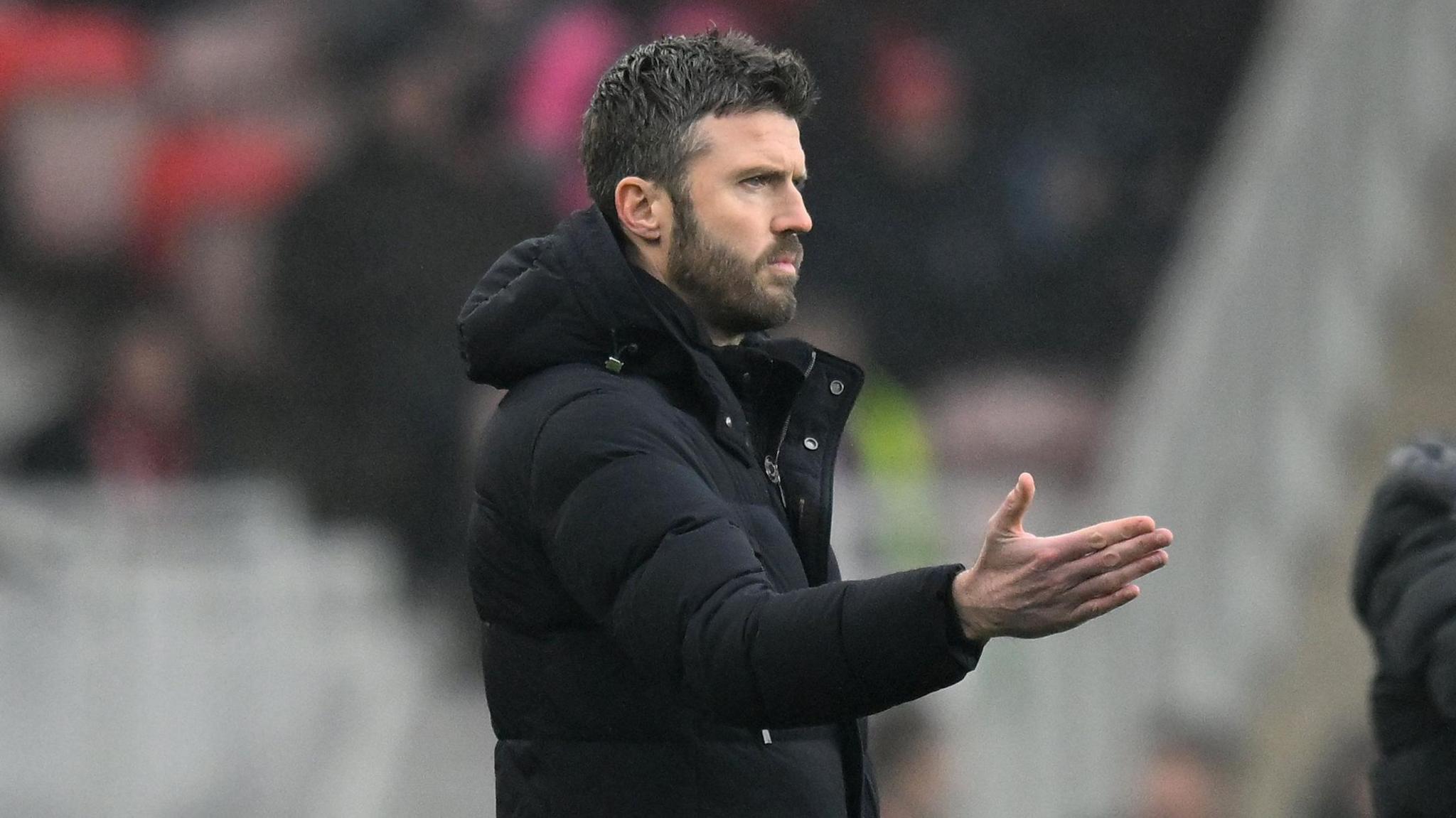 Middlesbrough manager Michael Carrick makes a hand gesture during his team's home defeat by Watford