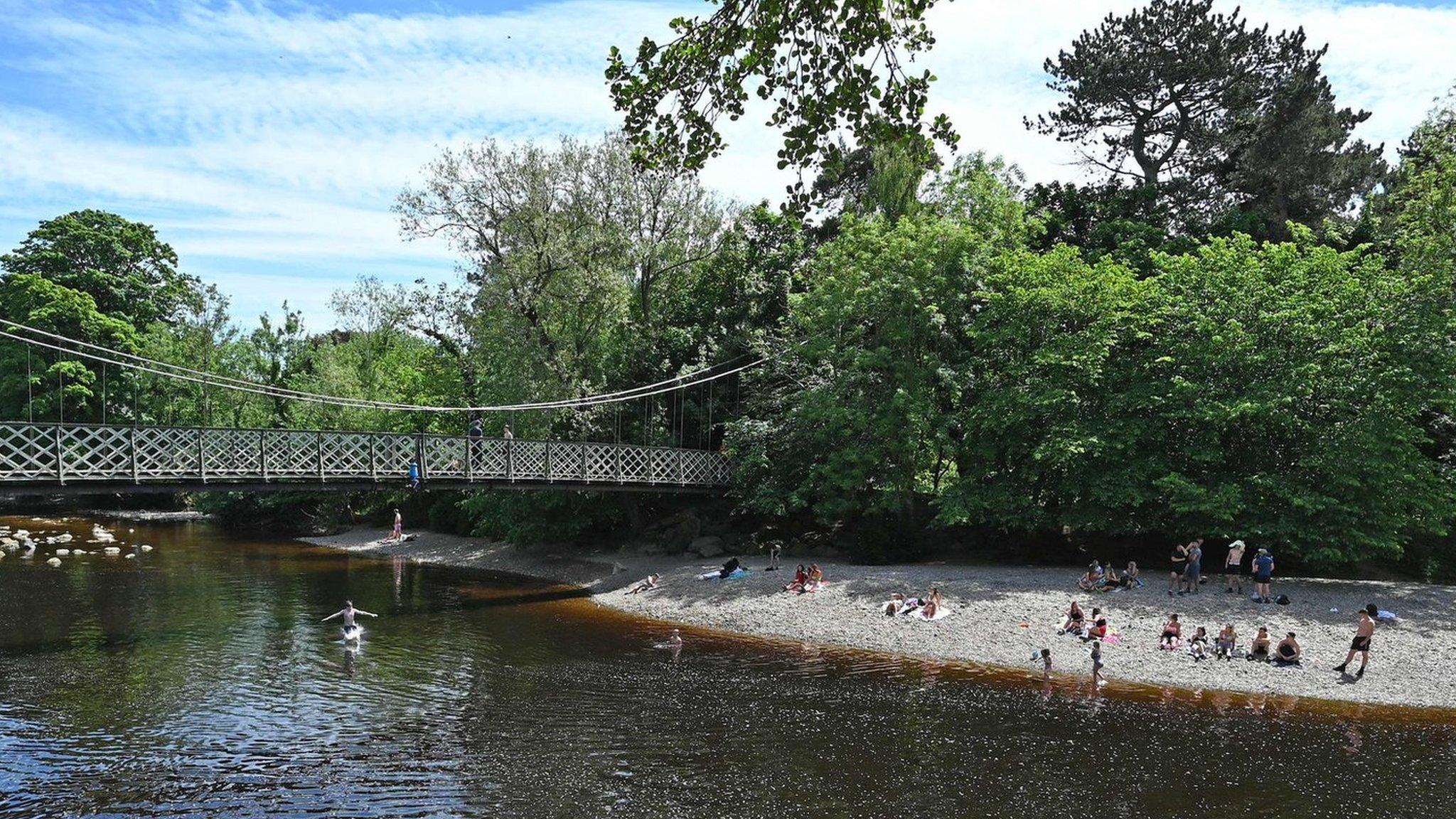 Bathers enjoying Ilkley hope River Wharfe this summer