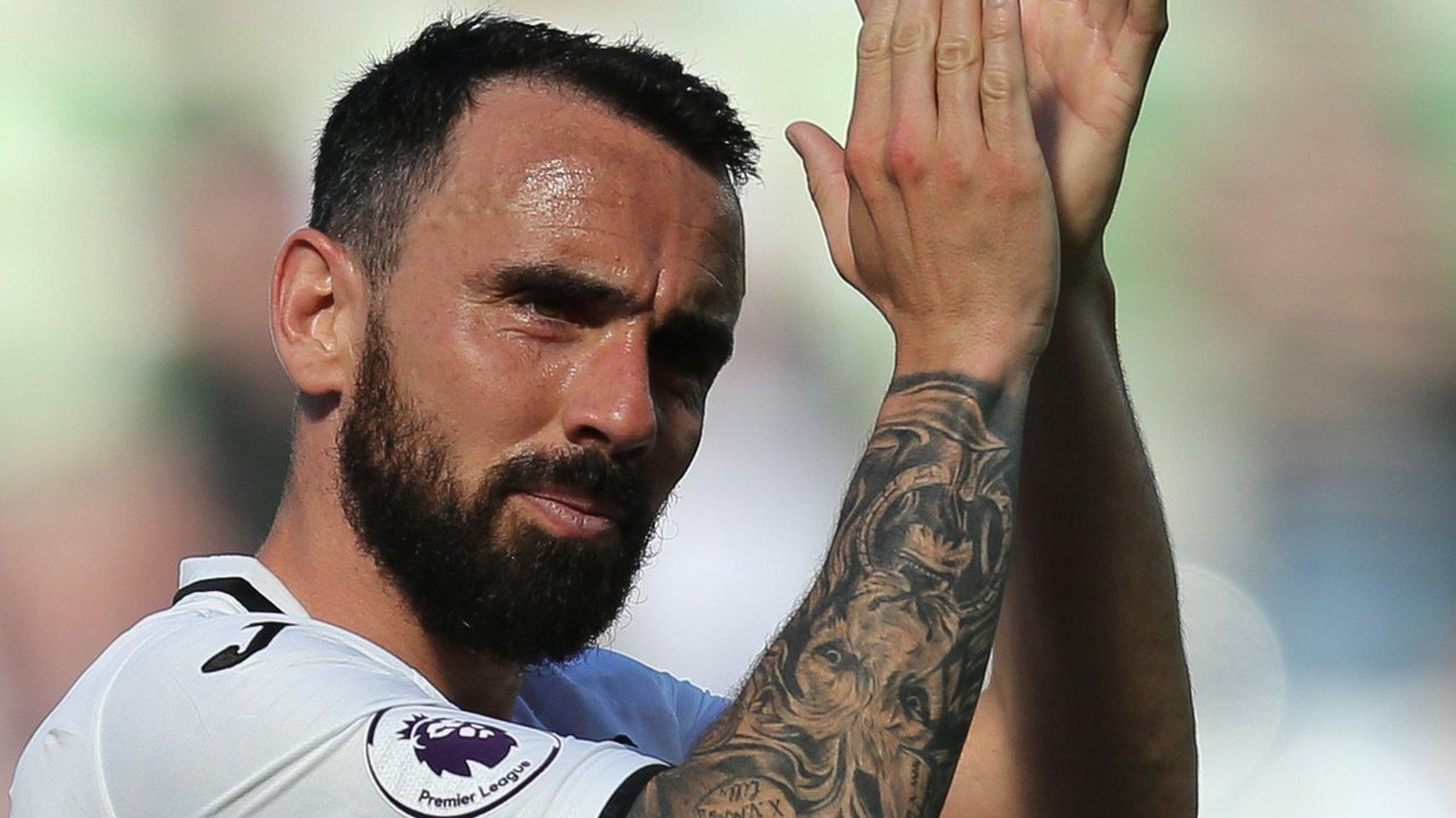 Leon Britton applauds Swansea's fans in his last appearance for them