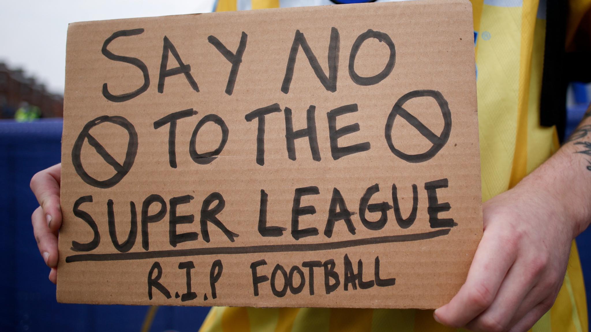 Anti European Super League placard