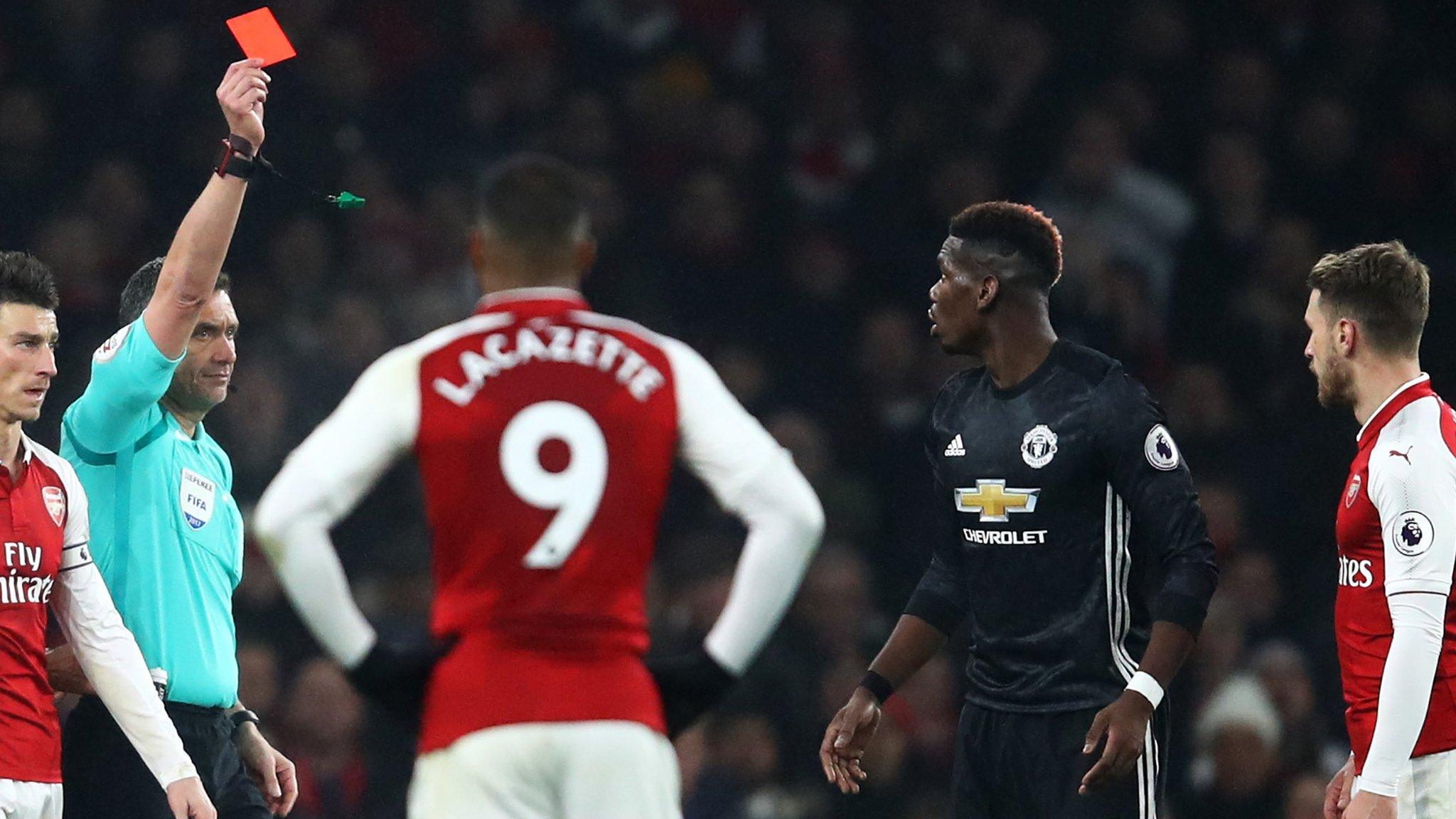 Paul Pogba is shown a red card