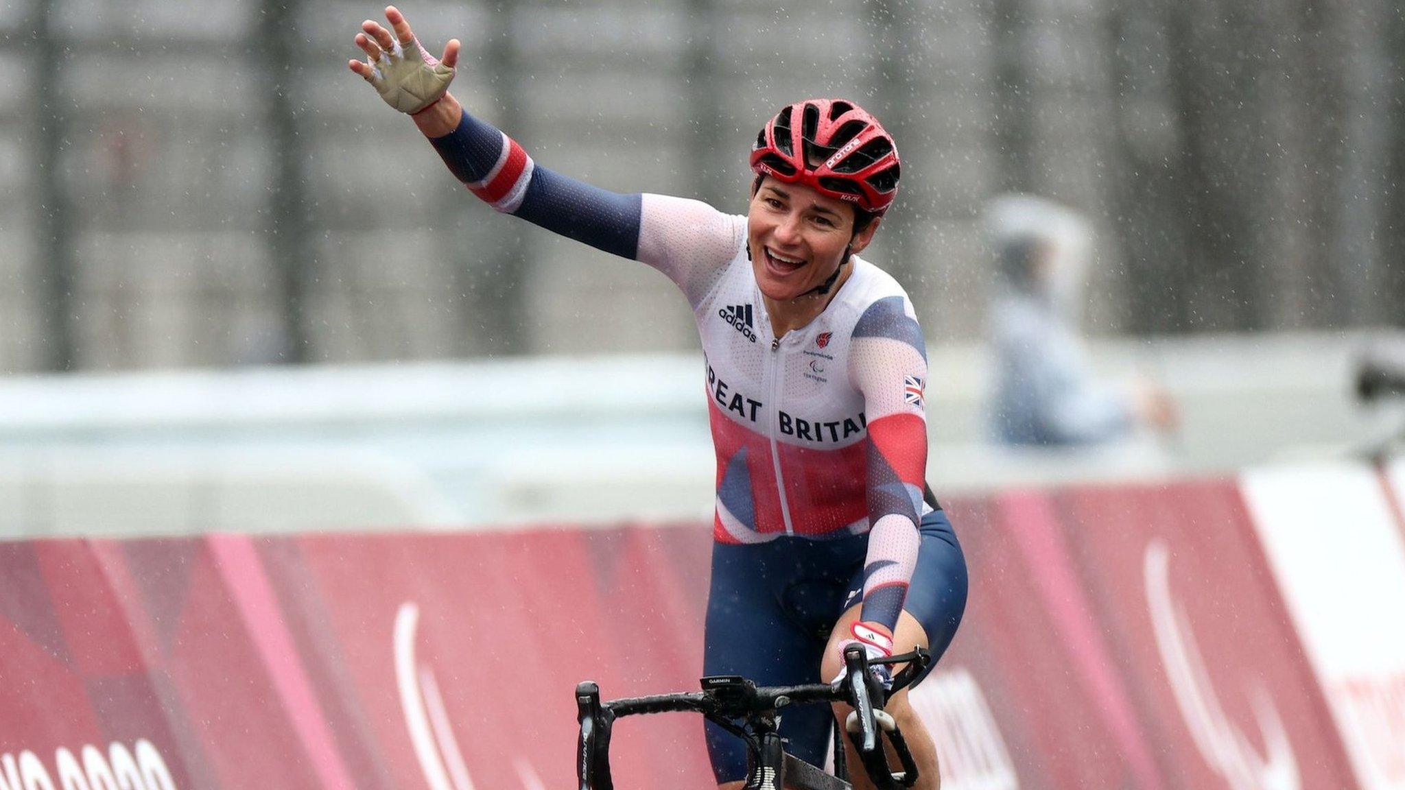 Sarah Storey celebrates crossing the line