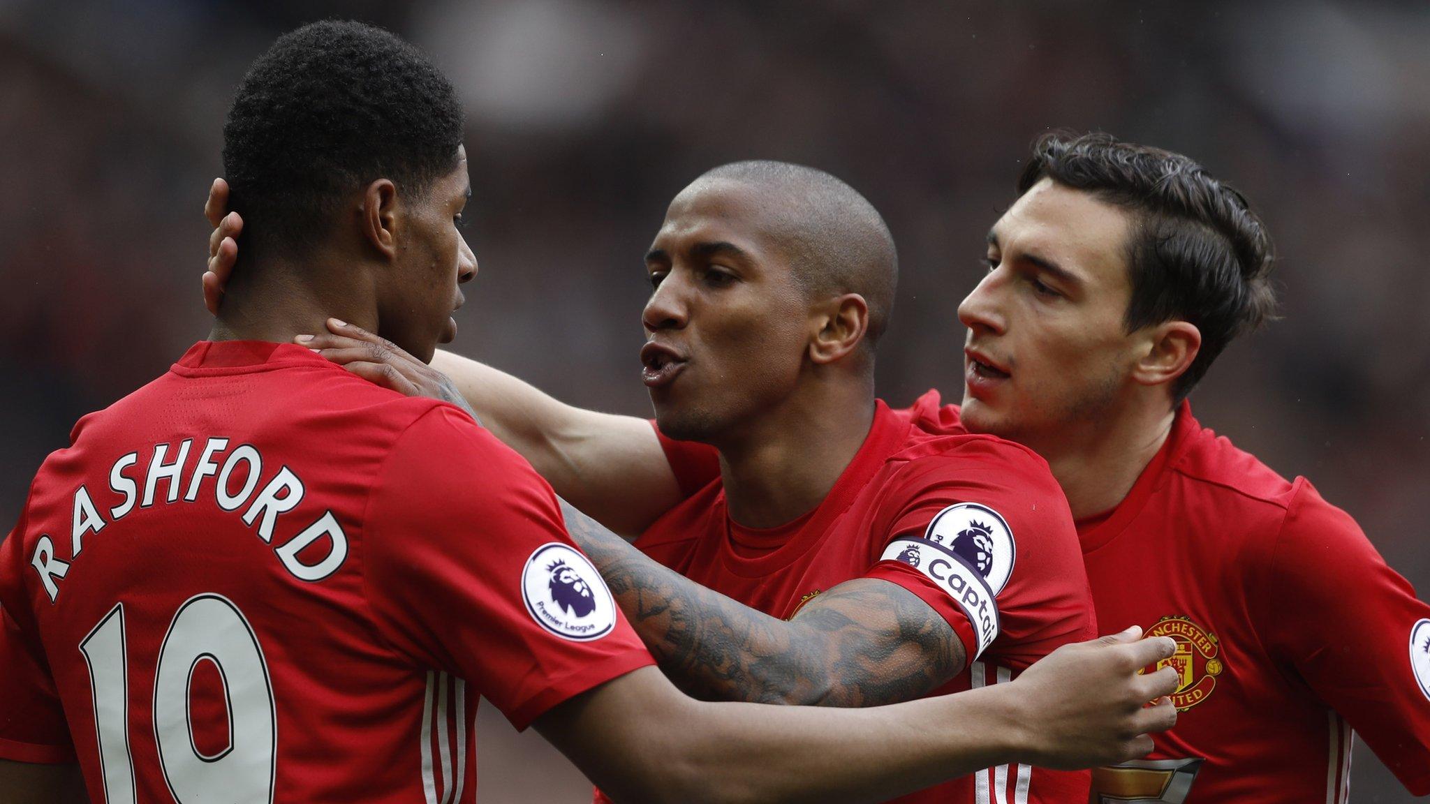 Marcus Rashford (left) celebrates scoring with team-mates