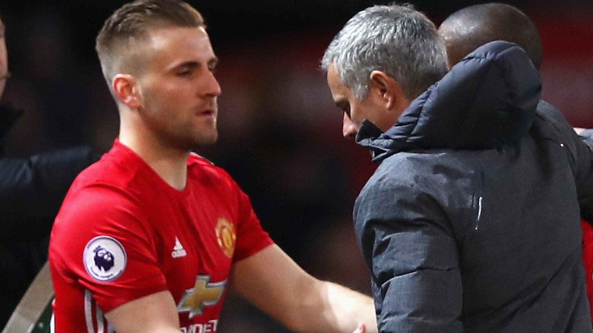 Luke Shaw and Jose Mourinho of Manchester United