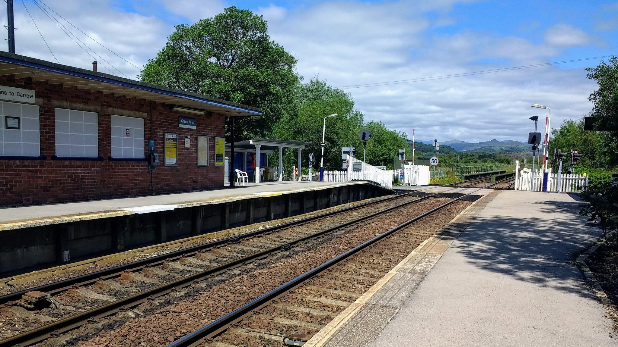 Rail track and platform at Green Road train station near Millom, Cumbria