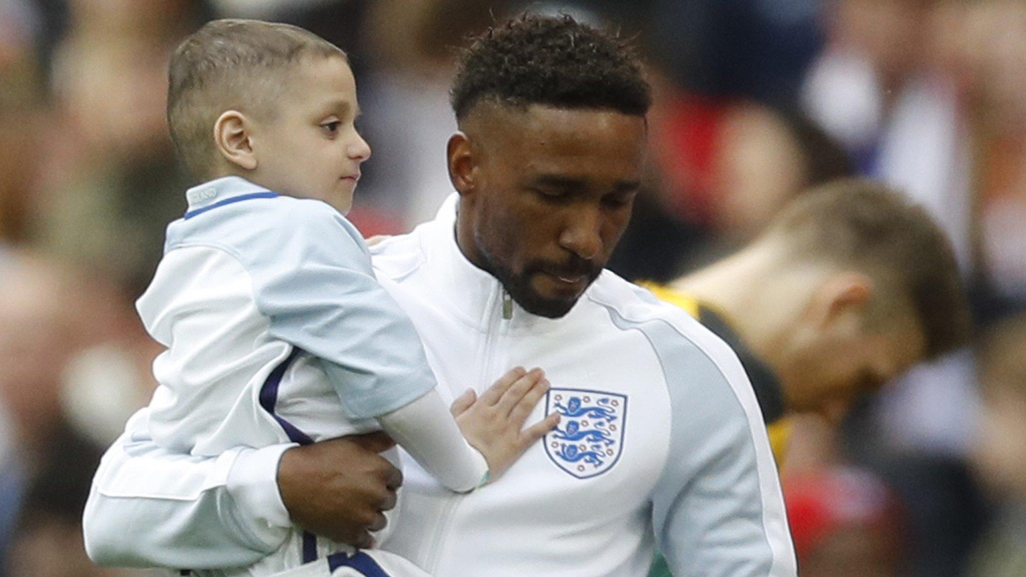 Jermain Defoe and Bradley Lowery