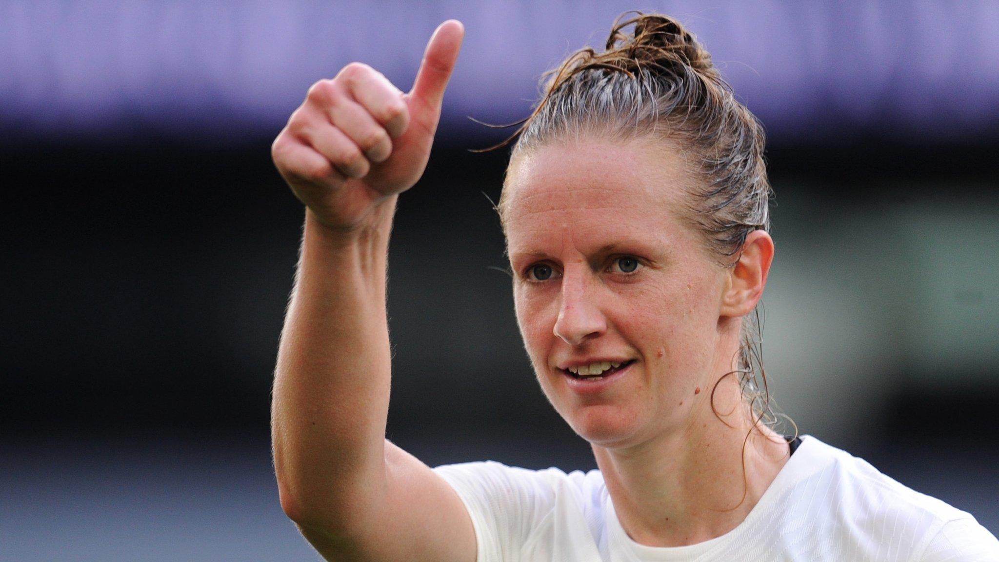 Kerys Harrop of Tottenham gives a thumbs up to supporters