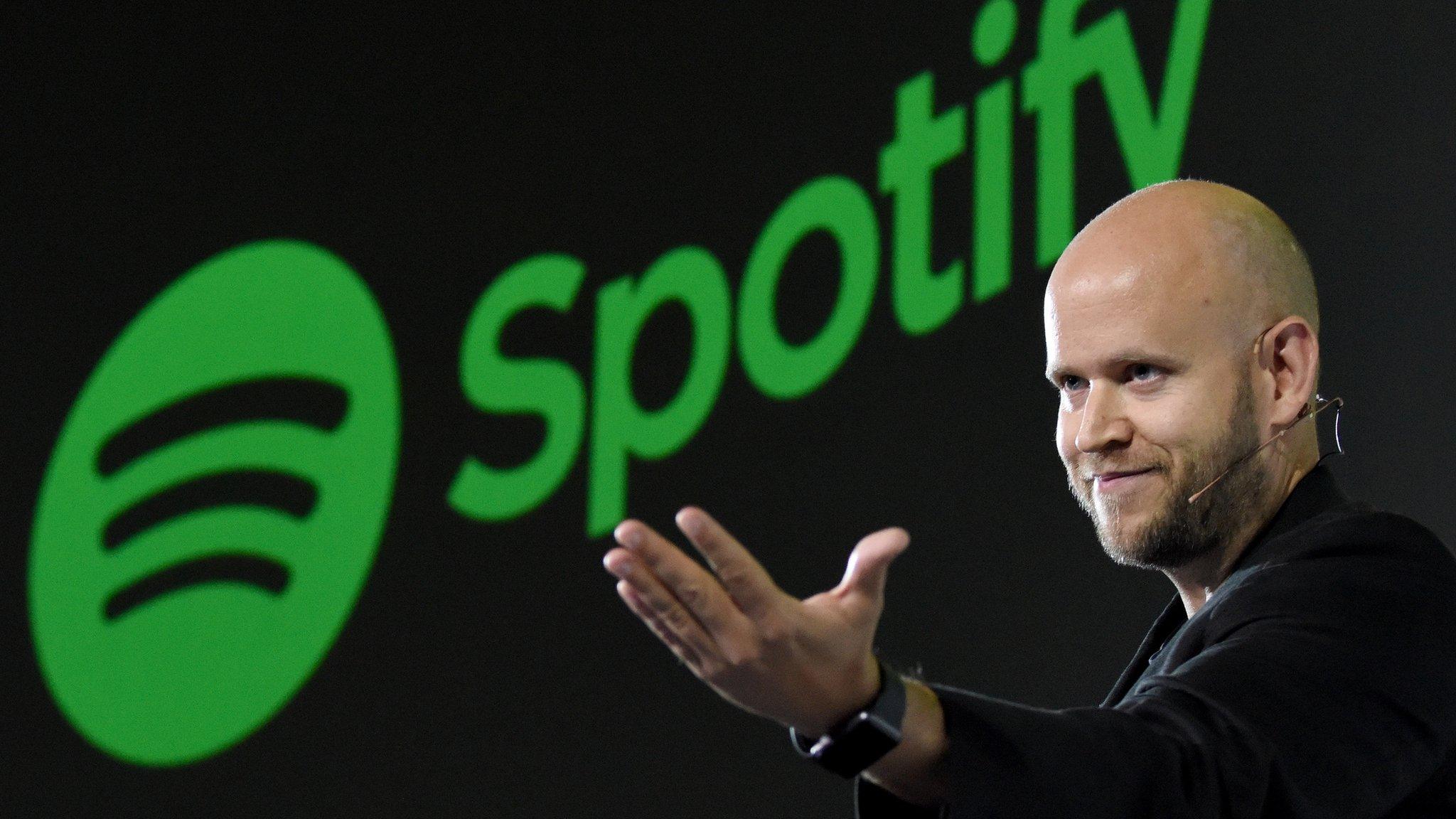 Daniel Ek, CEO of Swedish music streaming service Spotify, gestures as he makes a speech at a press conference in Tokyo on September 29, 2016. Spotify kicked off its services in Japan on September 29.