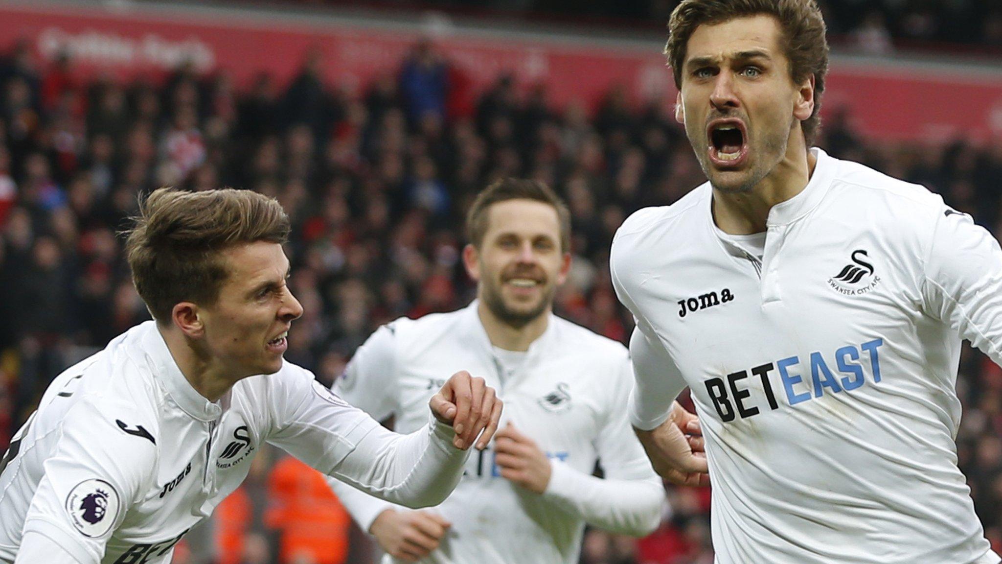 Fernando Llorente celebrates scoring for Swansea at Liverpool