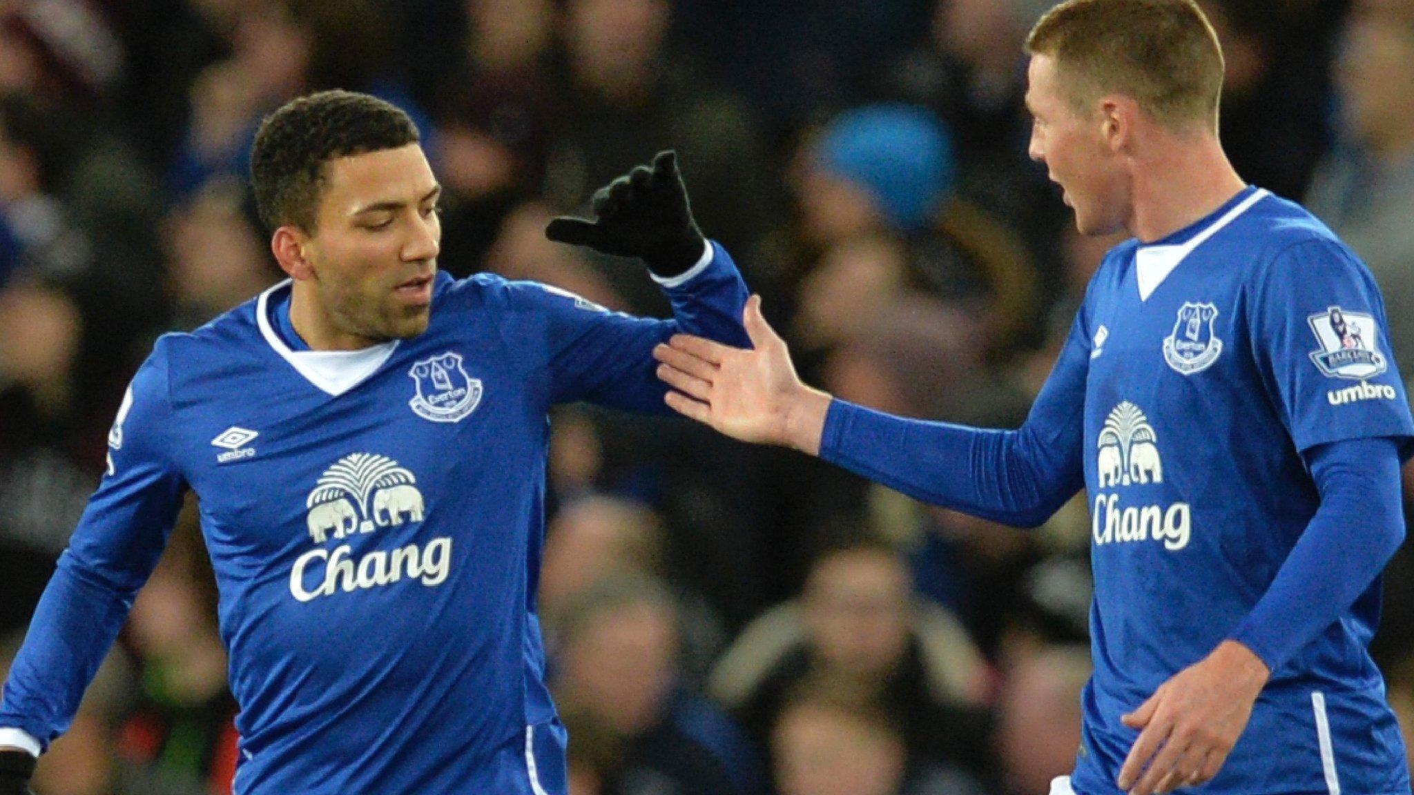 Aaron Lennon celebrates